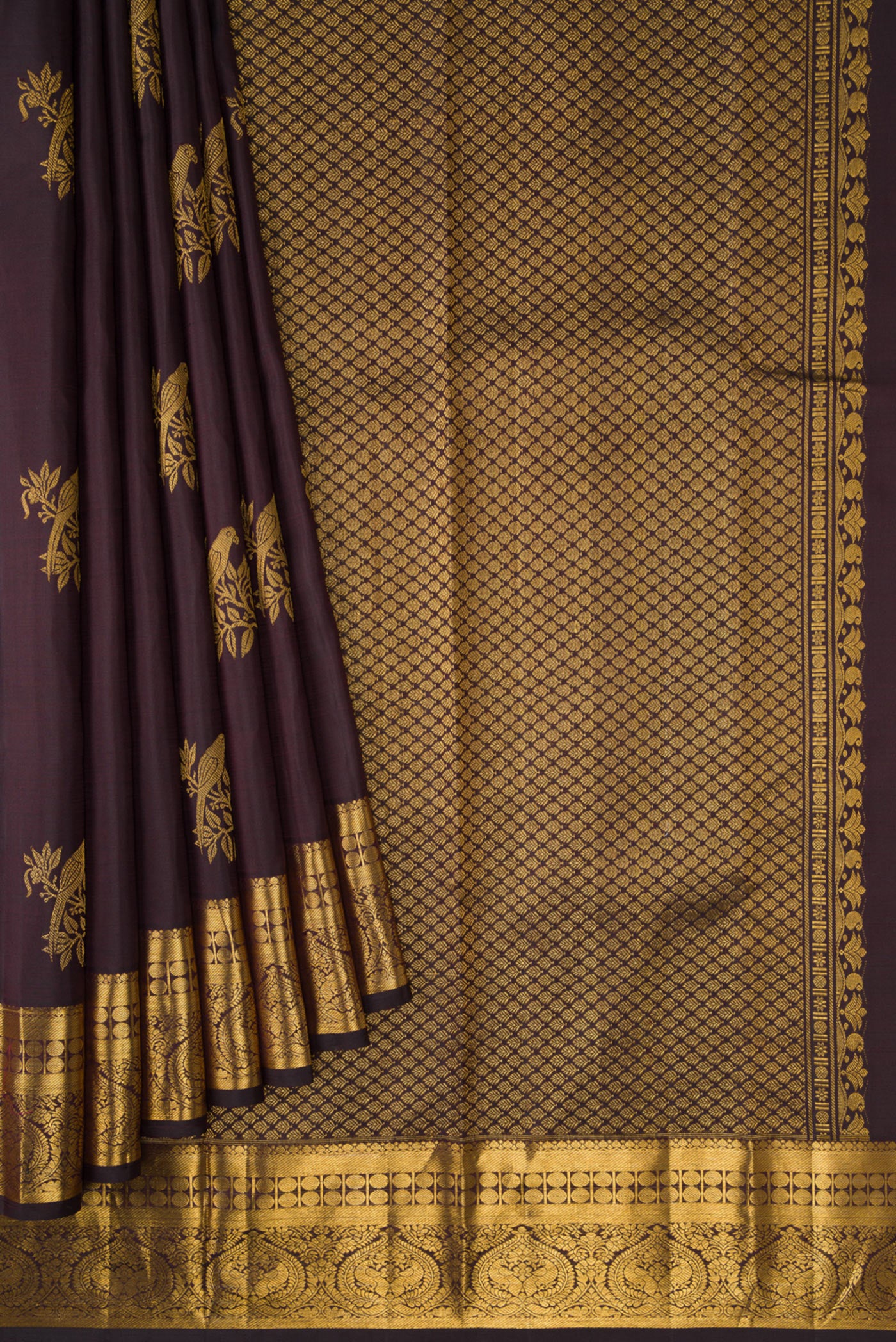 Pleats and pallu of Coffee Brown Dual Tone Kanjivaram Silk Saree with Zari Butta on the body and Zari Border. 