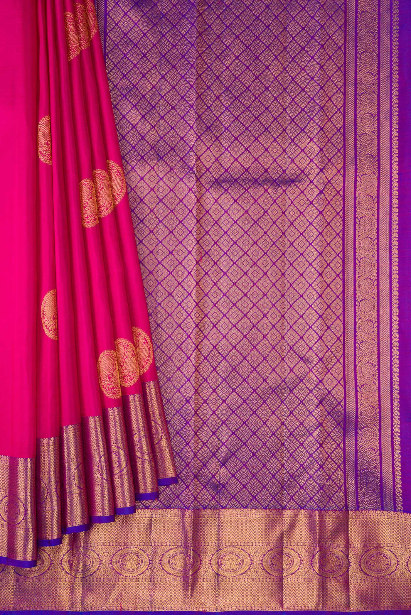 Pleats and pallu of Dark Pink Dual Tone Kanjivaram Silk Saree with Zari Butta on the body and Zari Border. 