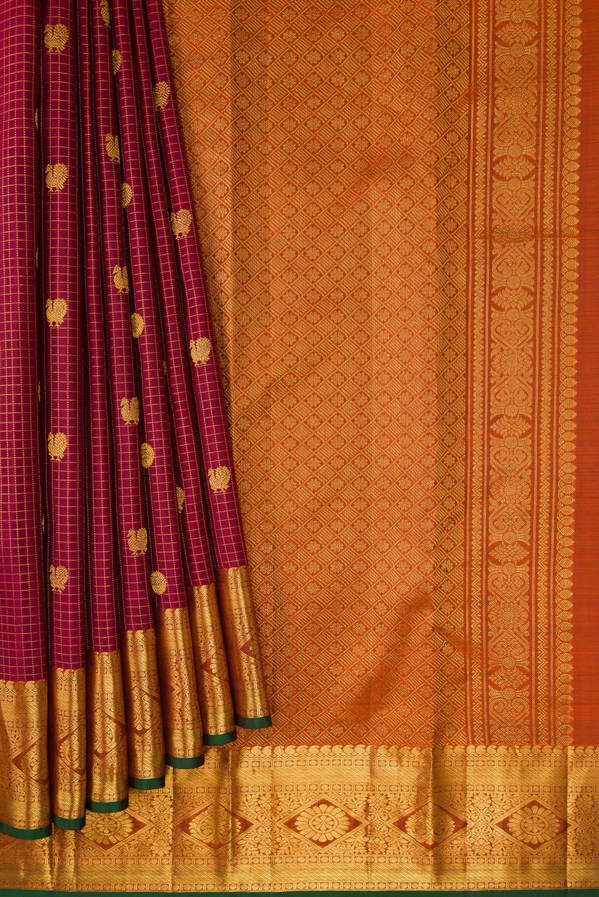 Pleats and pallu of Maroon Dual Tone Kanjivaram Silk Saree with Checked design on the body and Zari Border. 