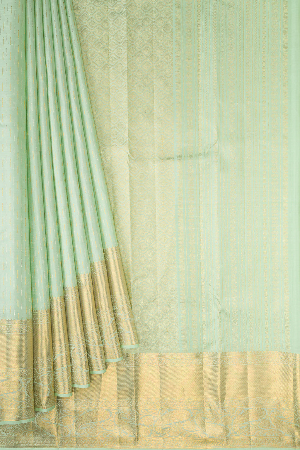 Pleats and pallu of Pista Green Dual Tone Kanjivaram Silk Saree with Zari Brocade on the body and Zari Border. 