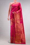 Pink Dual Tone Kanjivaram Silk Saree with Checked design on the body and Fancy Border.  displayed on a mannequin