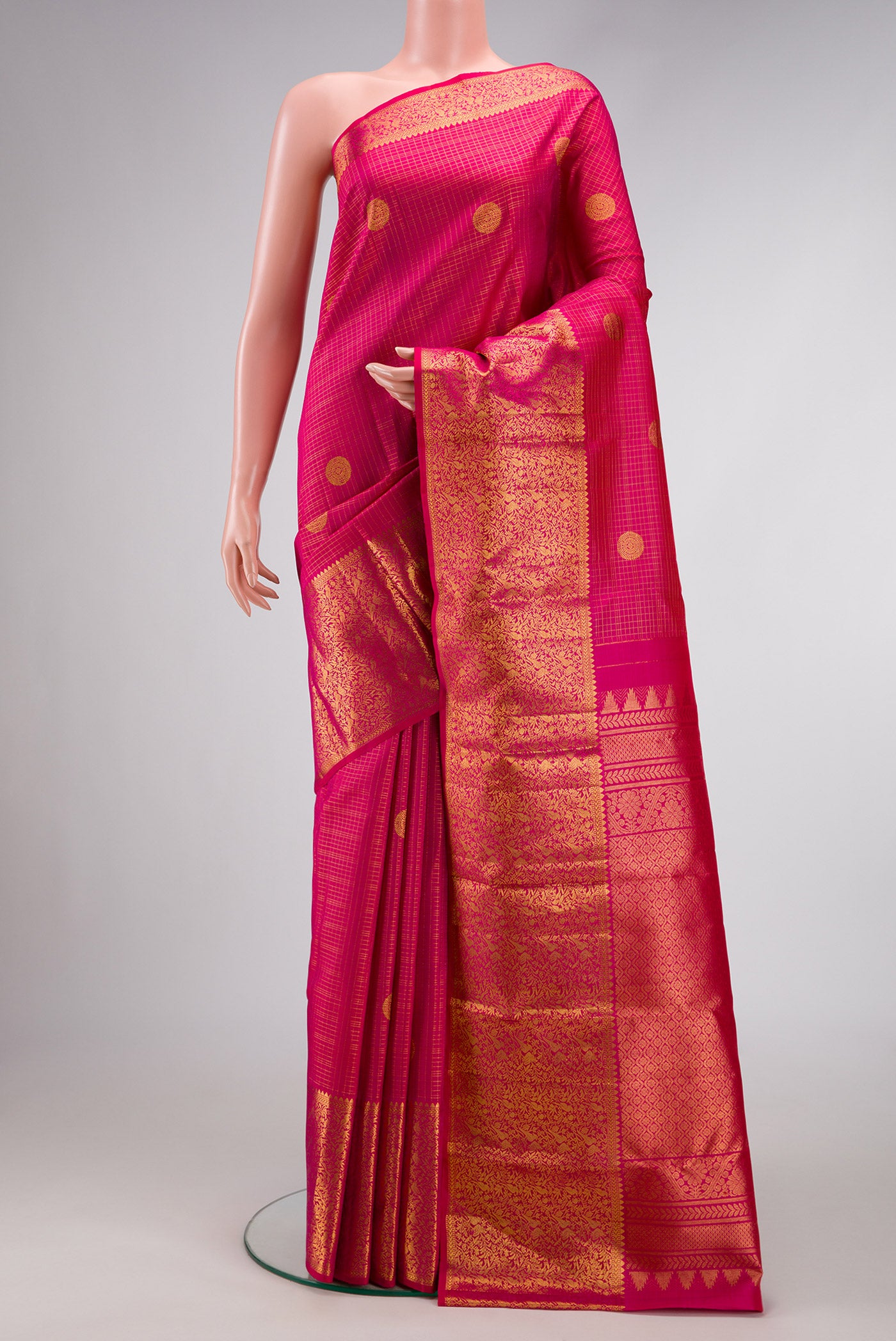 Pink Dual Tone Kanjivaram Silk Saree with Checked design on the body and Fancy Border.  displayed on a mannequin