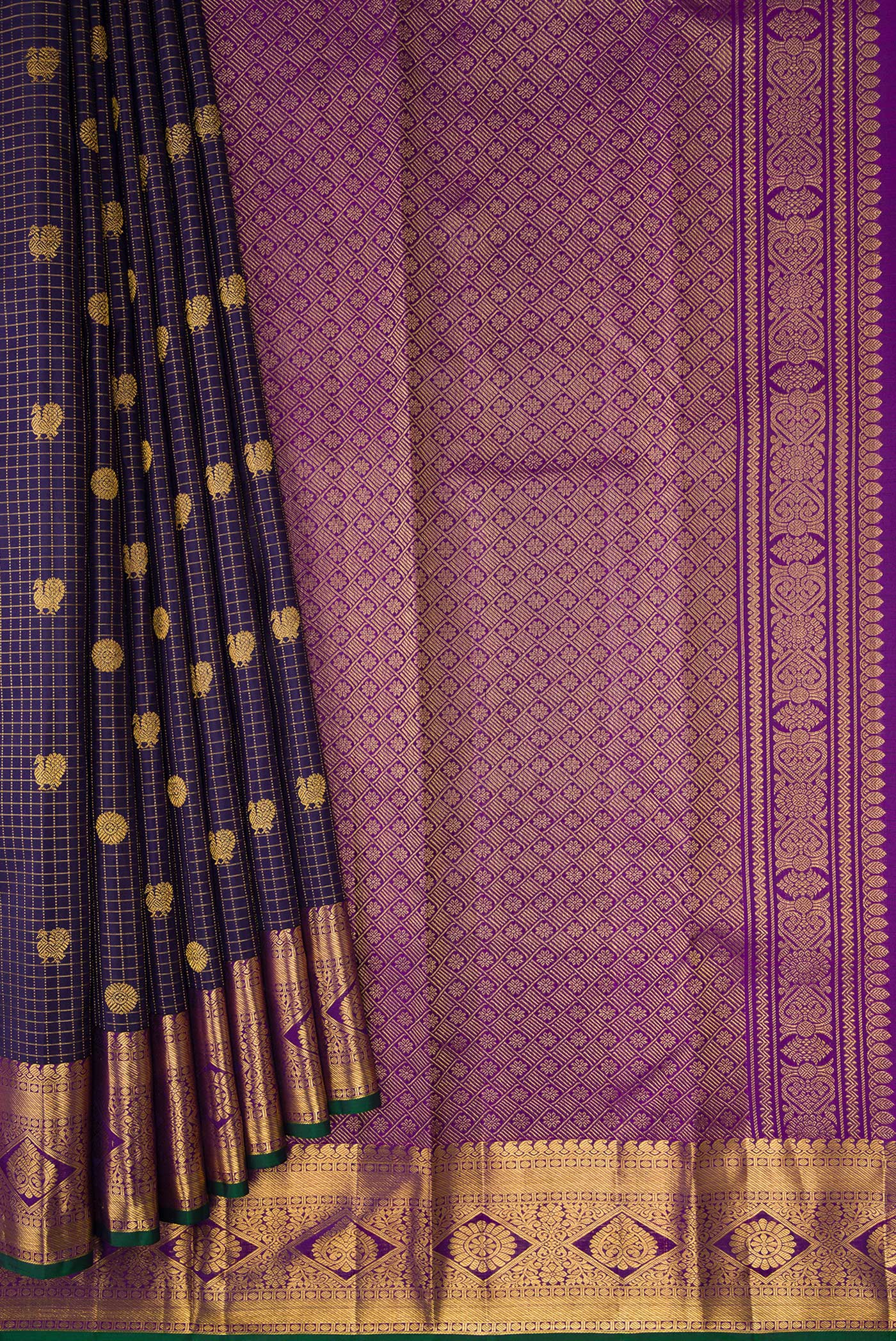 Pleats and pallu of Navy Blue Dual Tone Kanjivaram Silk Saree with Checked design on the body and Zari Border. 
