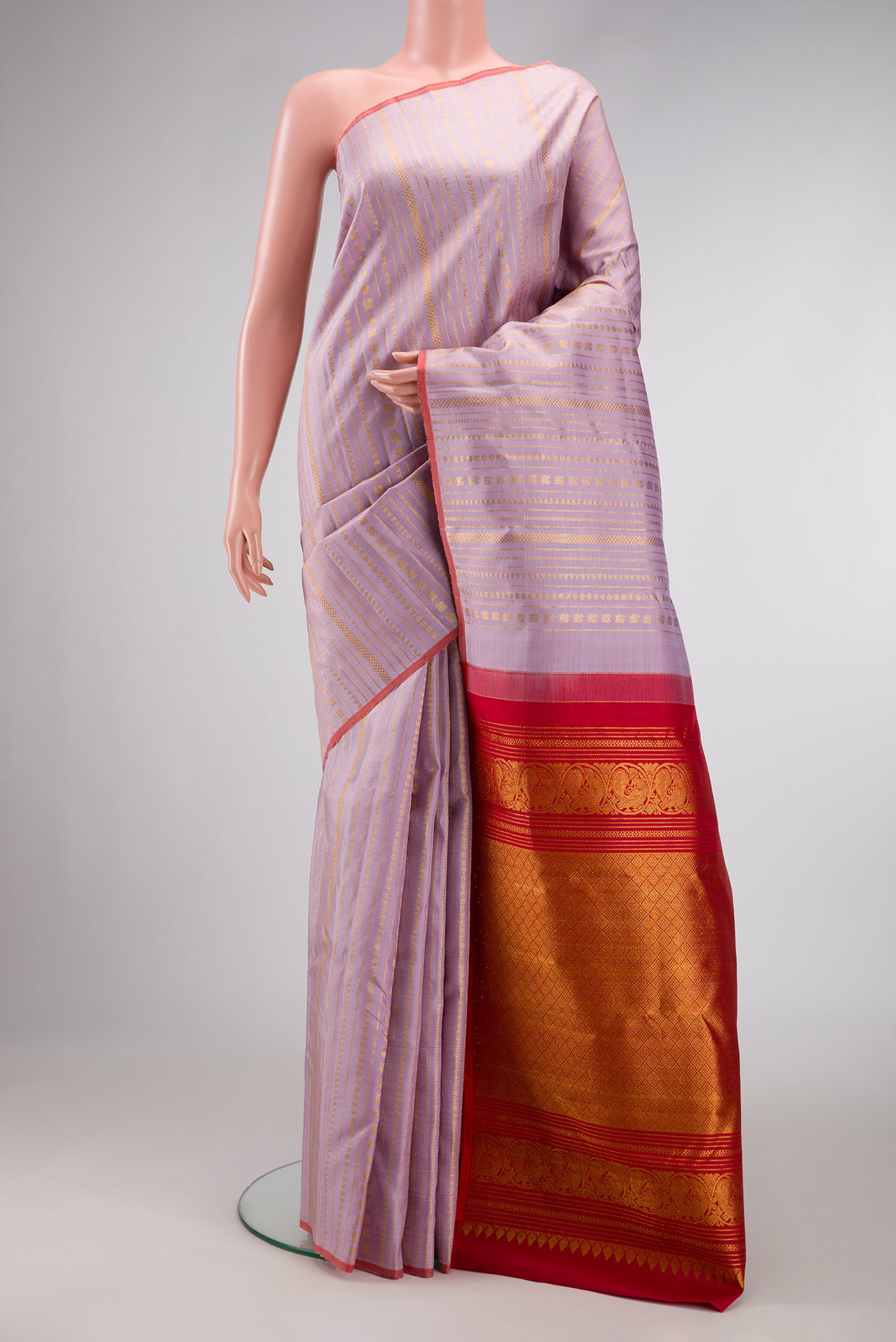 Lavender Dual Tone Kanchipuram Silk Saree with Stripes on the body and Without Border.  displayed on a mannequin