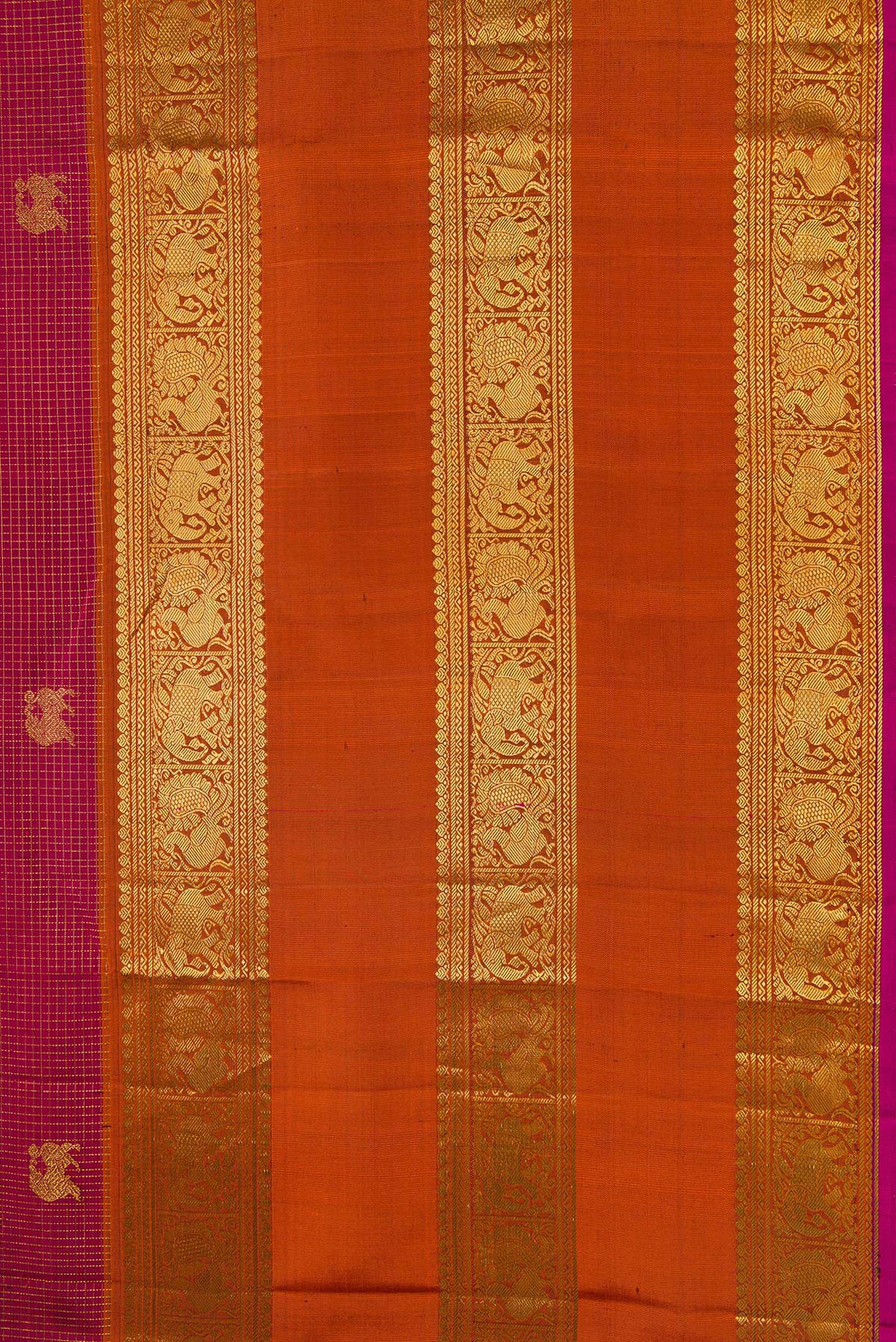 Border image of Maroon Kanjivaram Silk Saree with Zari Butta on the body and Zari Border. 