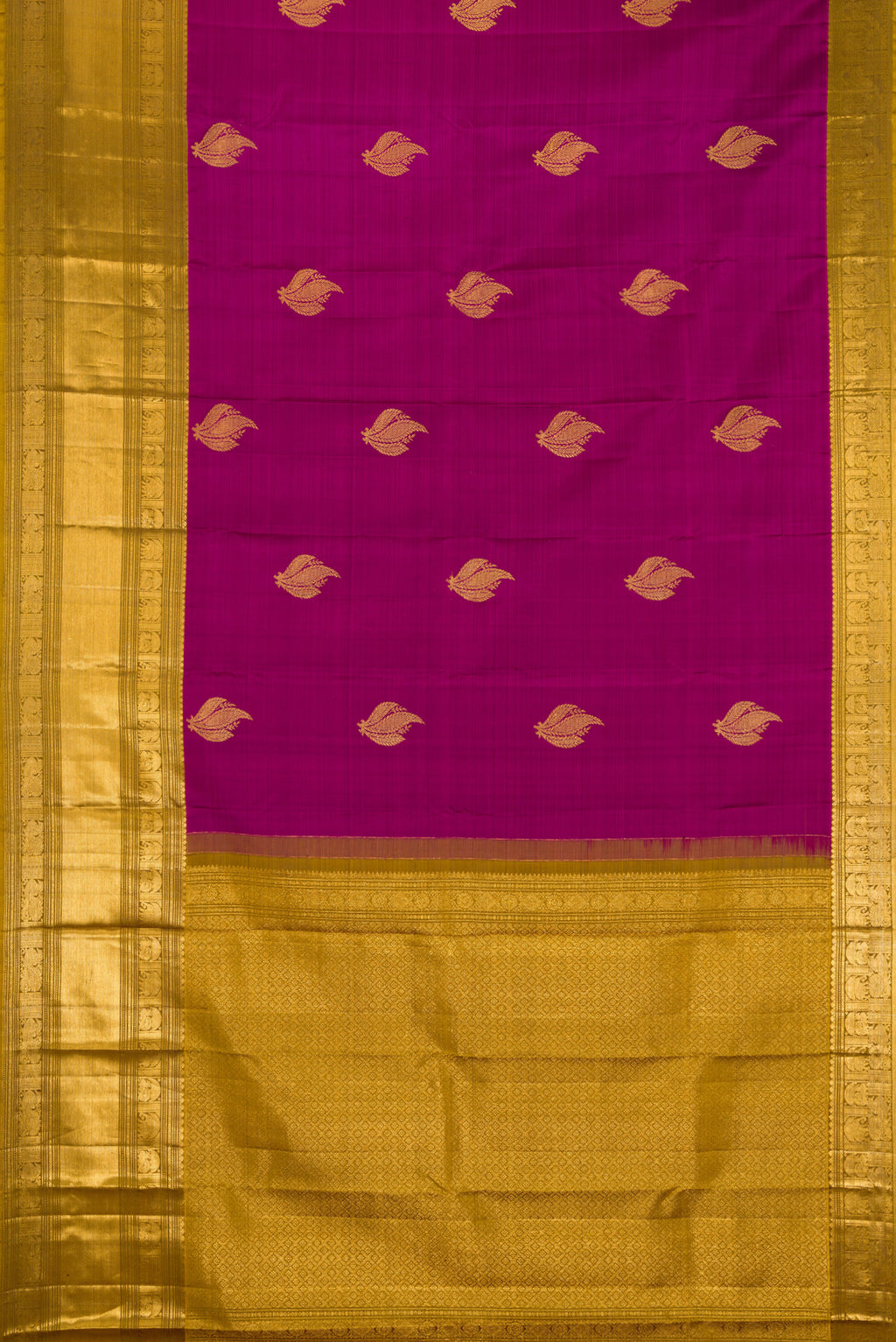 Flat view of Magenta Kanchipuram Silk Saree with Zari Butta on the body and Zari Border. 