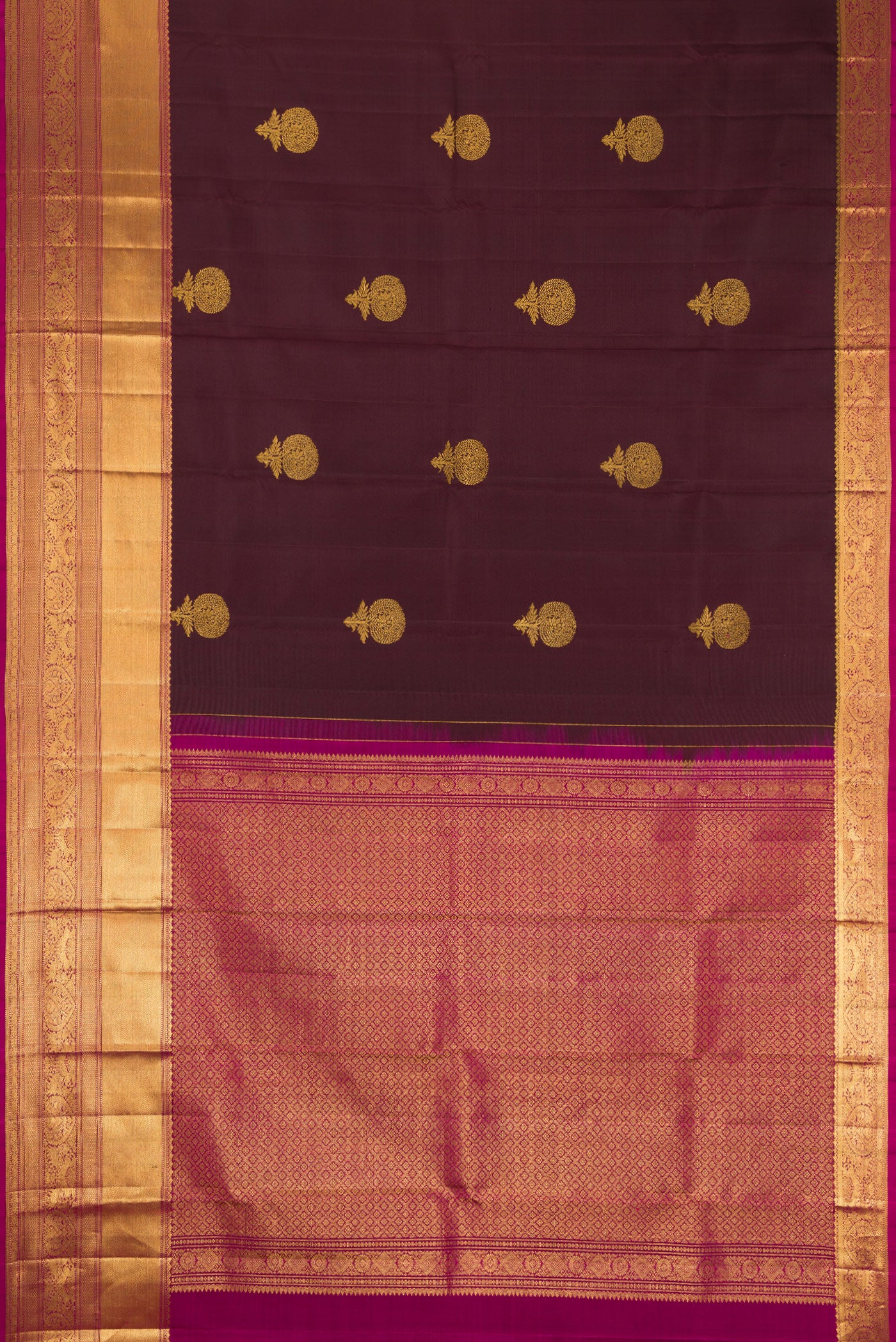 Flat view of Brown Kanchipuram Silk Saree with Zari Butta on the body and Zari Border. 