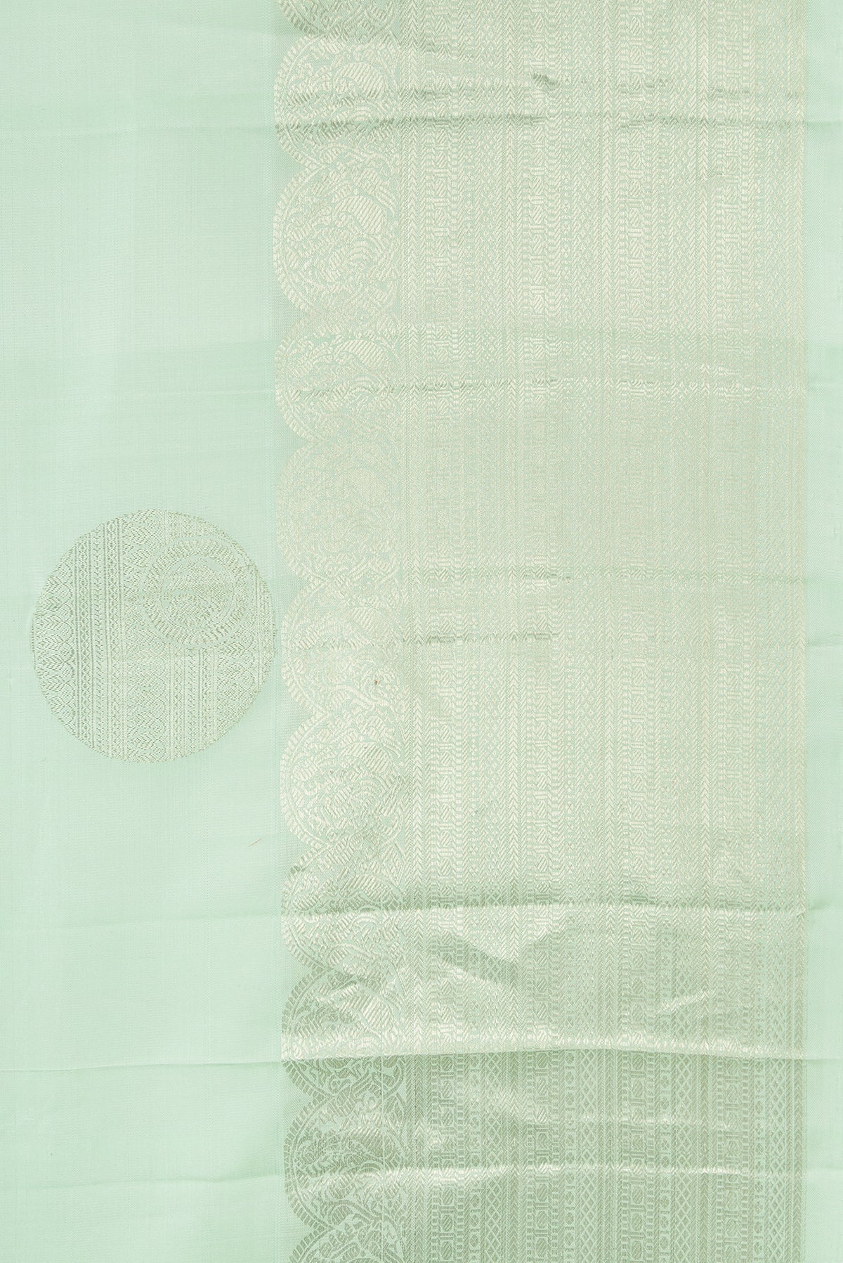 Border image of Pista Green Dual Tone Kanchipuram Silk Saree with Zari Butta on the body and Zari Border. 