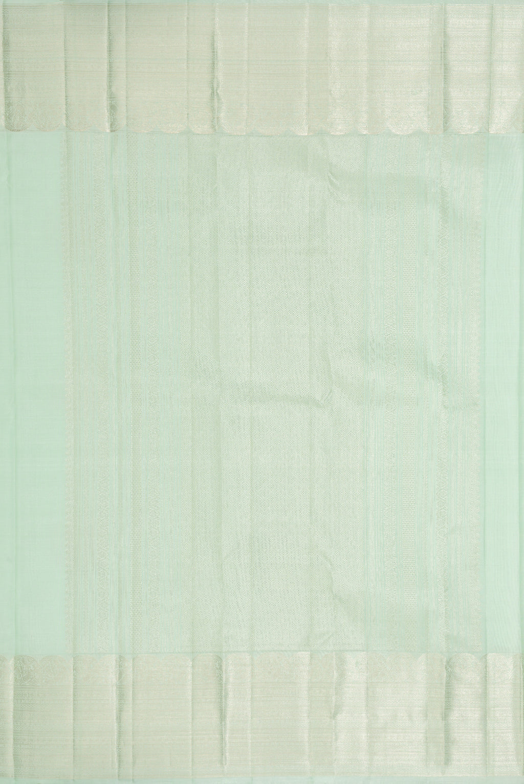 Close up image of the pallu of Pista Green Dual Tone Kanchipuram Silk Saree with Zari Butta on the body and Zari Border. 