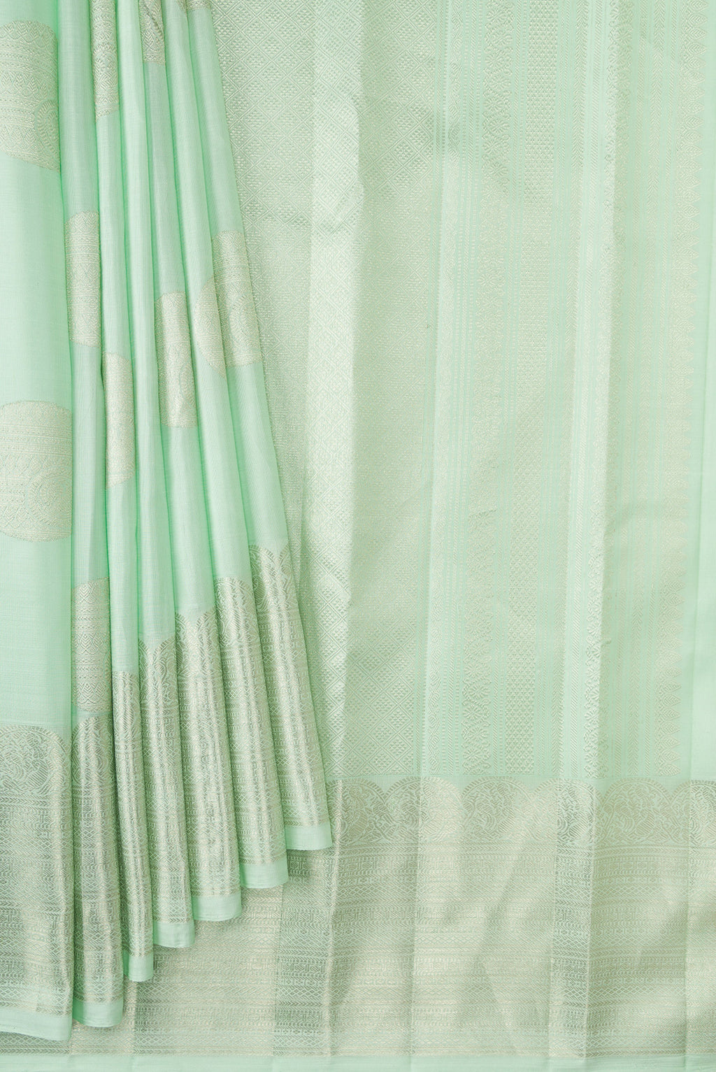 Pleats and pallu of Pista Green Dual Tone Kanchipuram Silk Saree with Zari Butta on the body and Zari Border. 