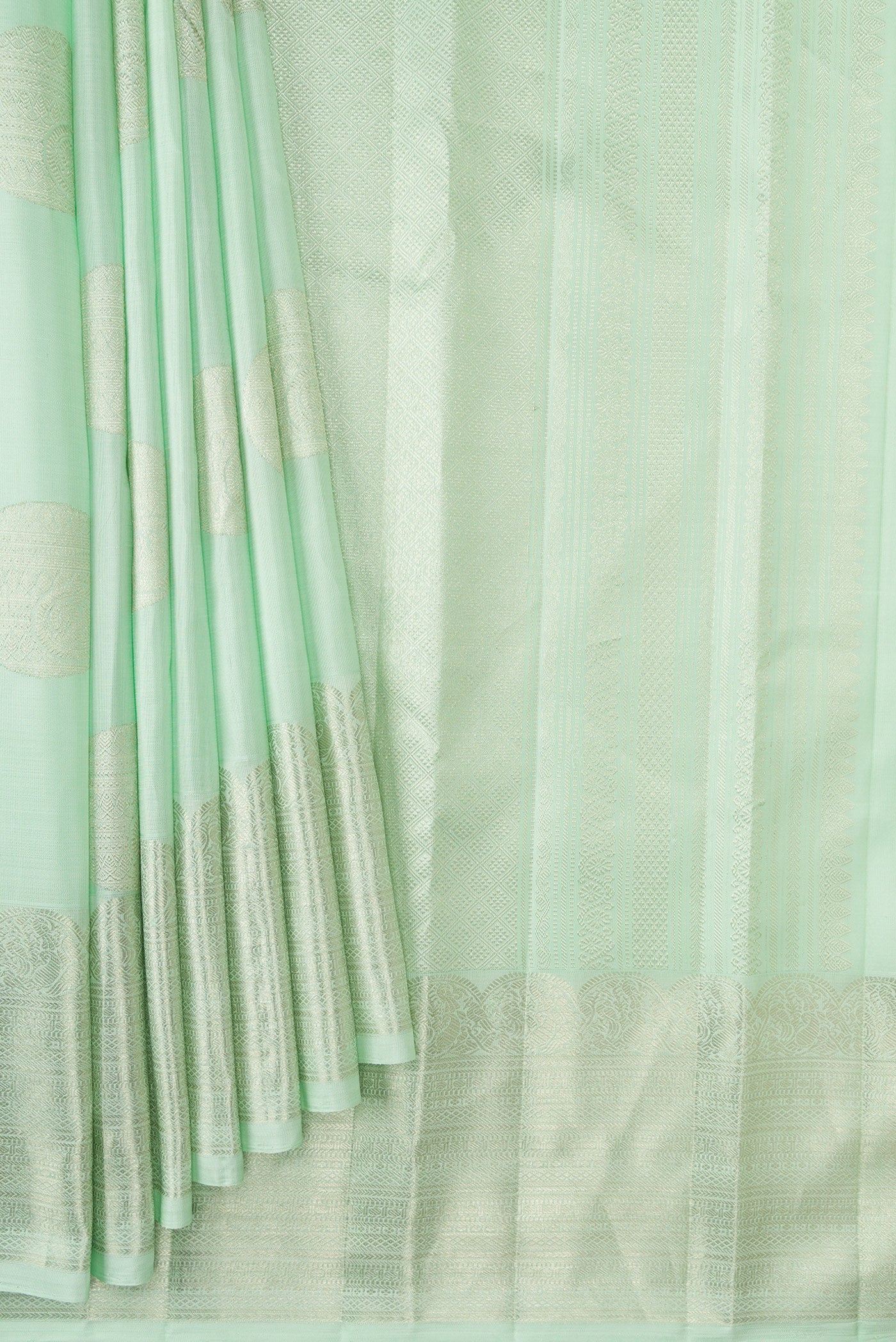 Pleats and pallu of Pista Green Dual Tone Kanchipuram Silk Saree with Zari Butta on the body and Zari Border. 