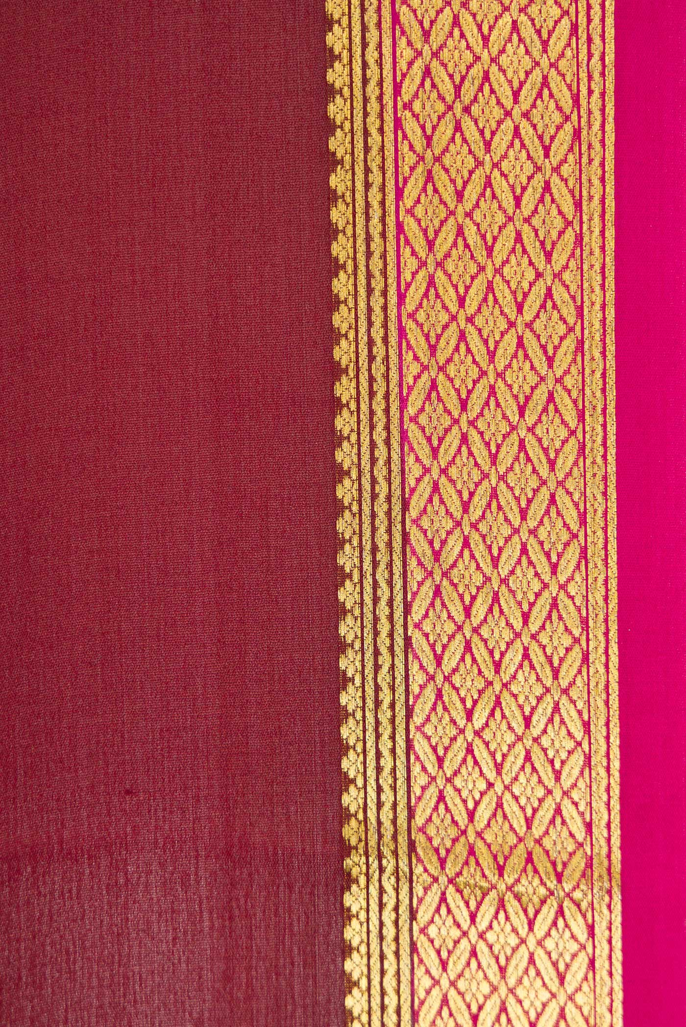 Border image of Brown Dual Tone Mysore Crepe Saree with Plain Body and Zari Border. 