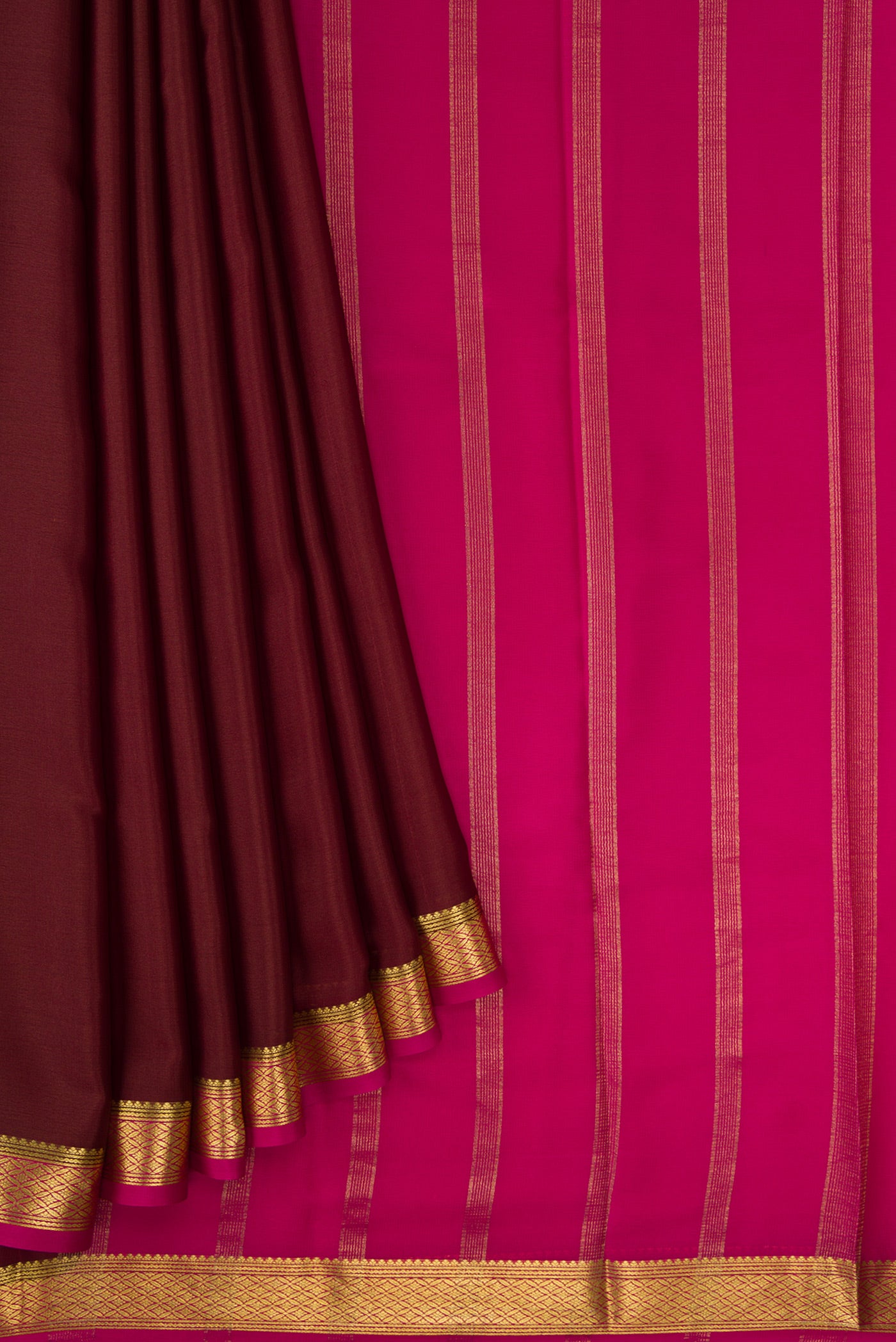 Pleats and pallu of Brown Dual Tone Mysore Crepe Saree with Plain Body and Zari Border. 