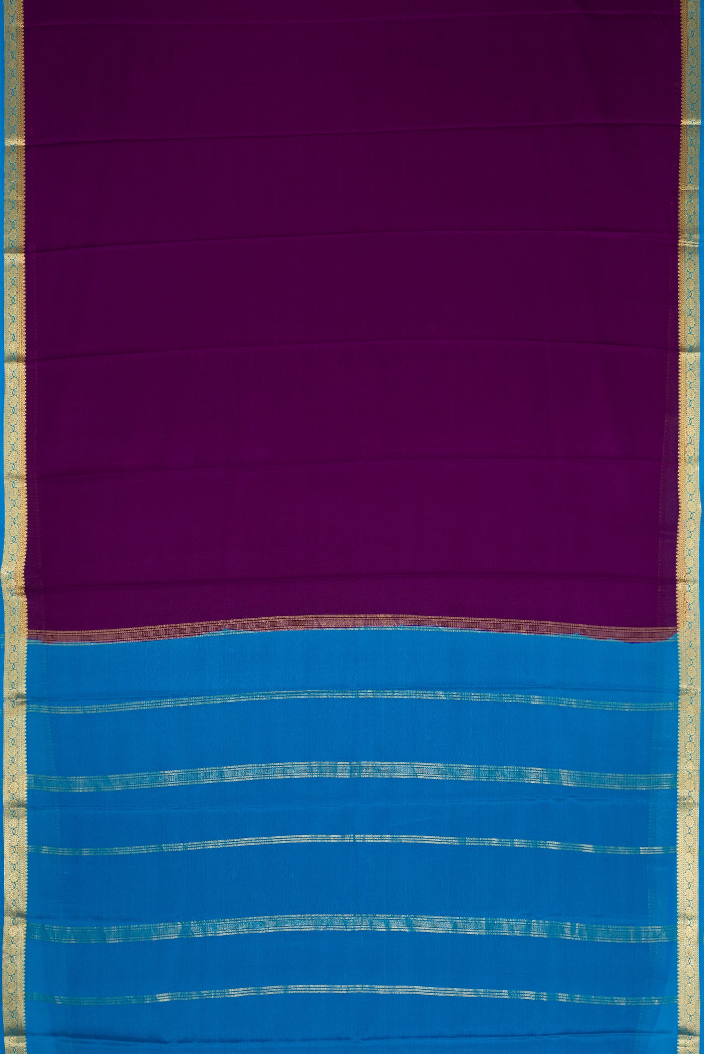Flat view of Violet Dual Tone Mysore Crepe Saree with Plain Body and Zari Border. 