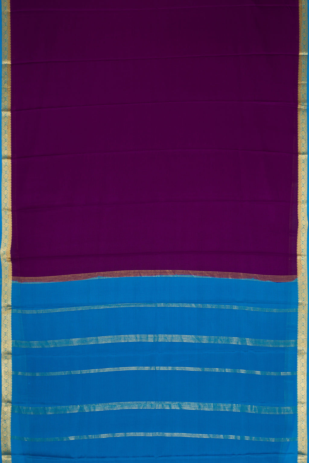 Violet Dual Tone Mysore Crepe Saree with Plain Body and Zari Border.  displayed on a mannequin