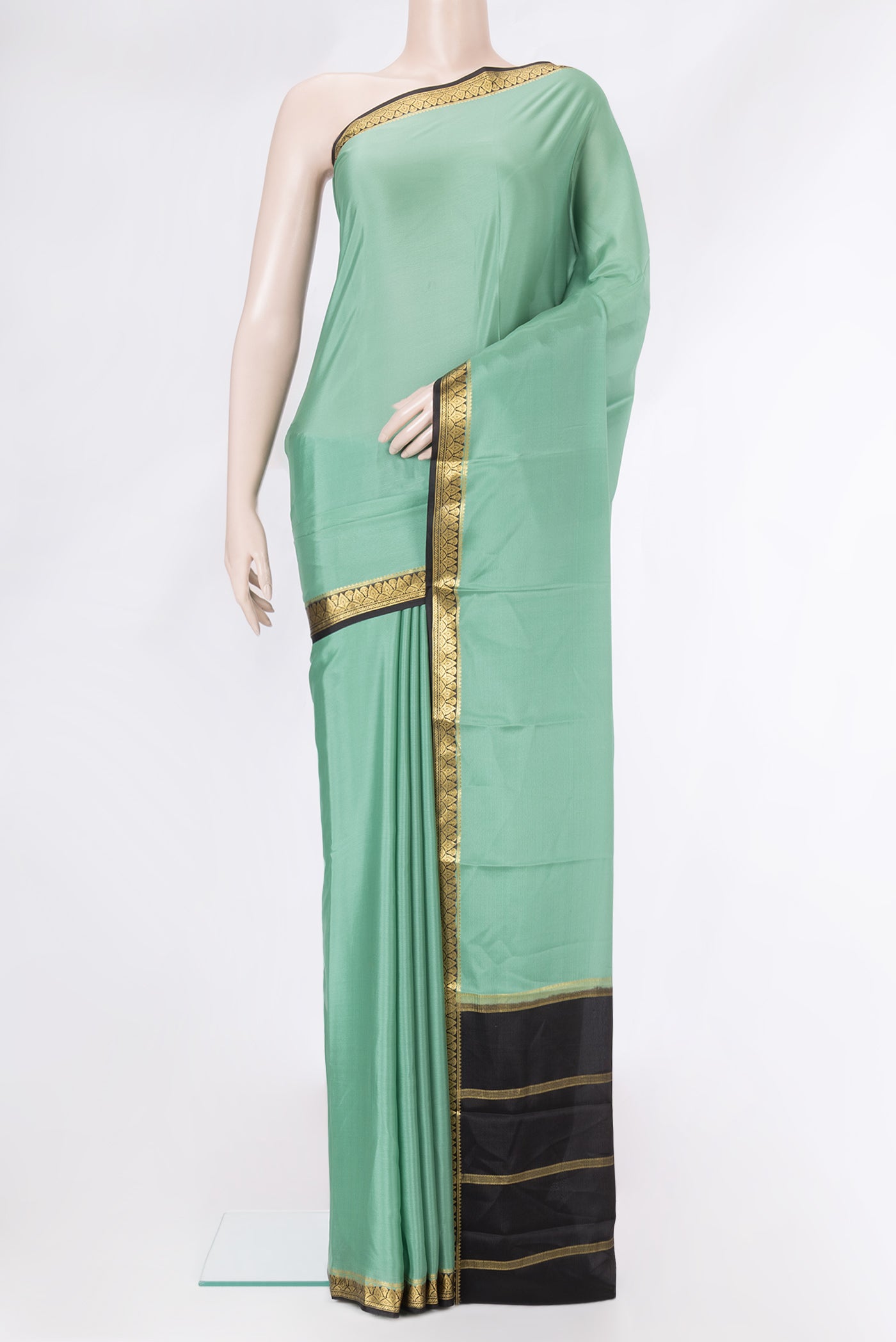 Sea Green Dual Tone Mysore Silk Saree with Plain Body and Zari Border.  displayed on a mannequin
