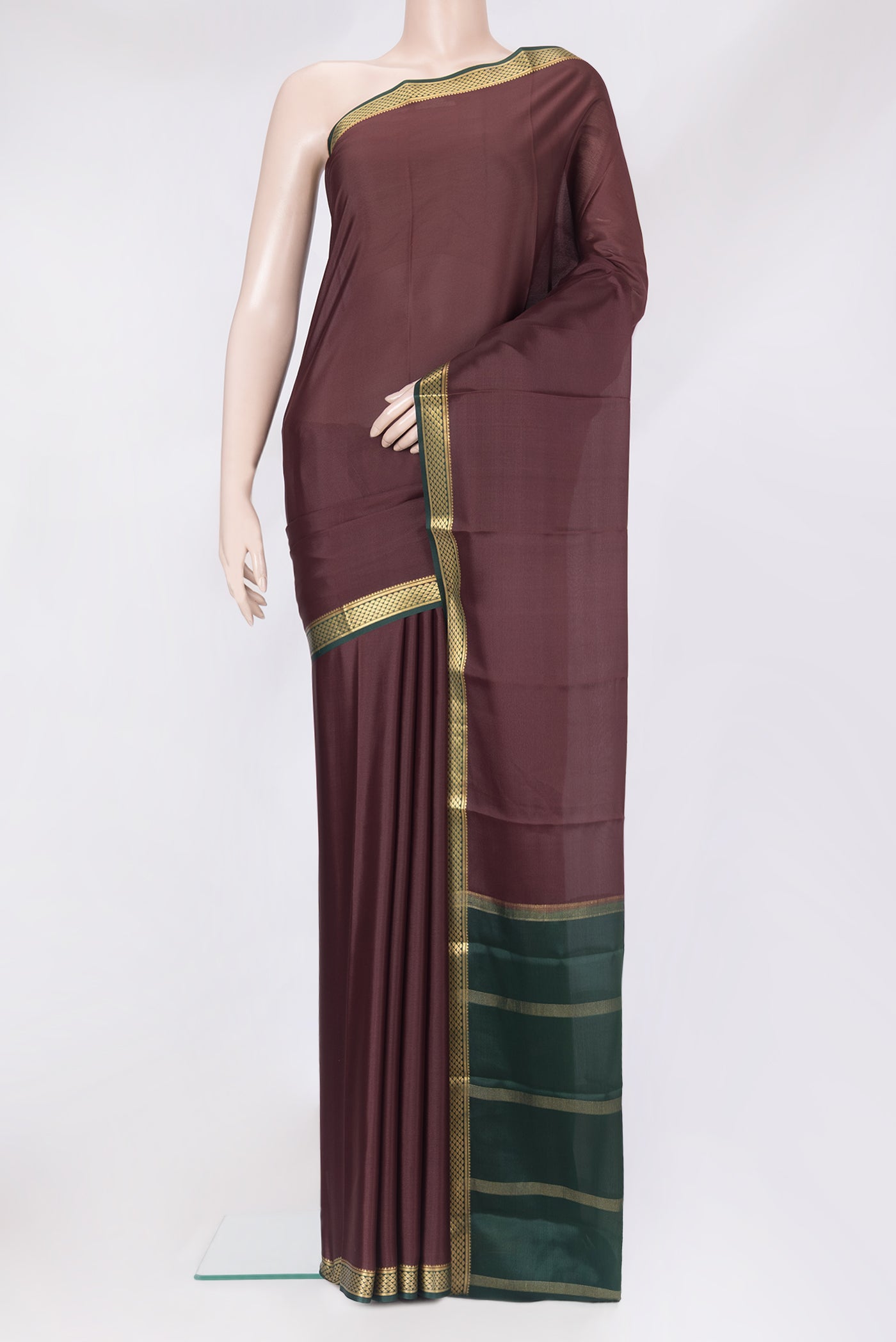 Coffee Brown Mysore Crepe Saree with Plain Body and Zari Border.  displayed on a mannequin