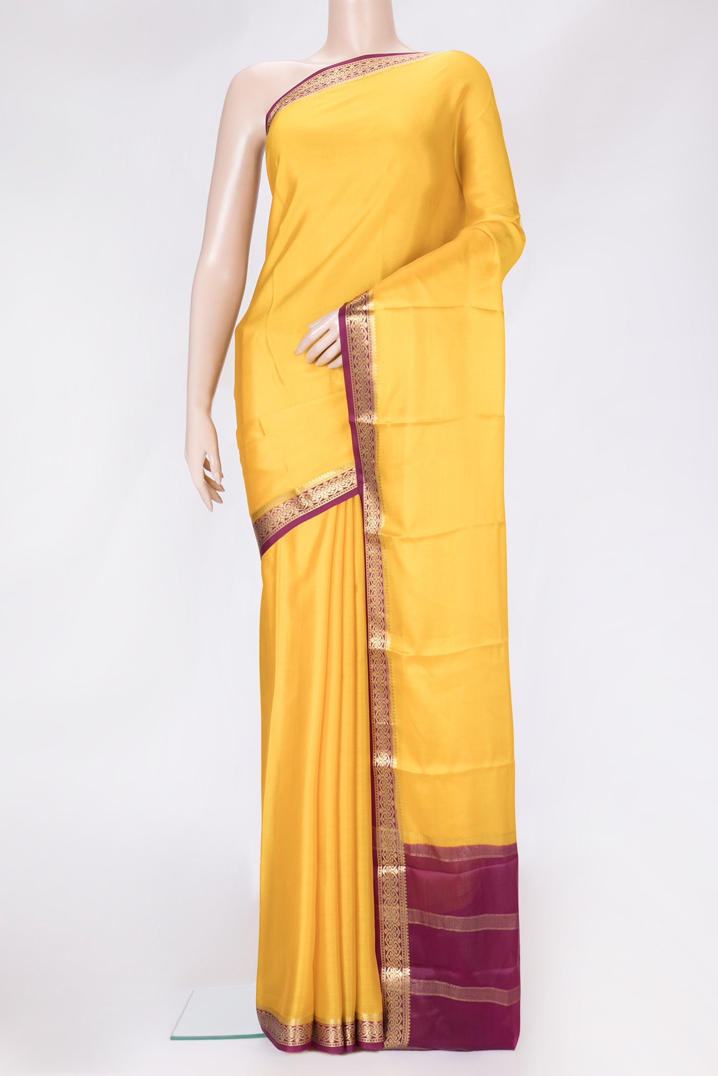 Yellow Dual Tone Mysore Silk Saree with Plain Body and Zari Border.  displayed on a mannequin