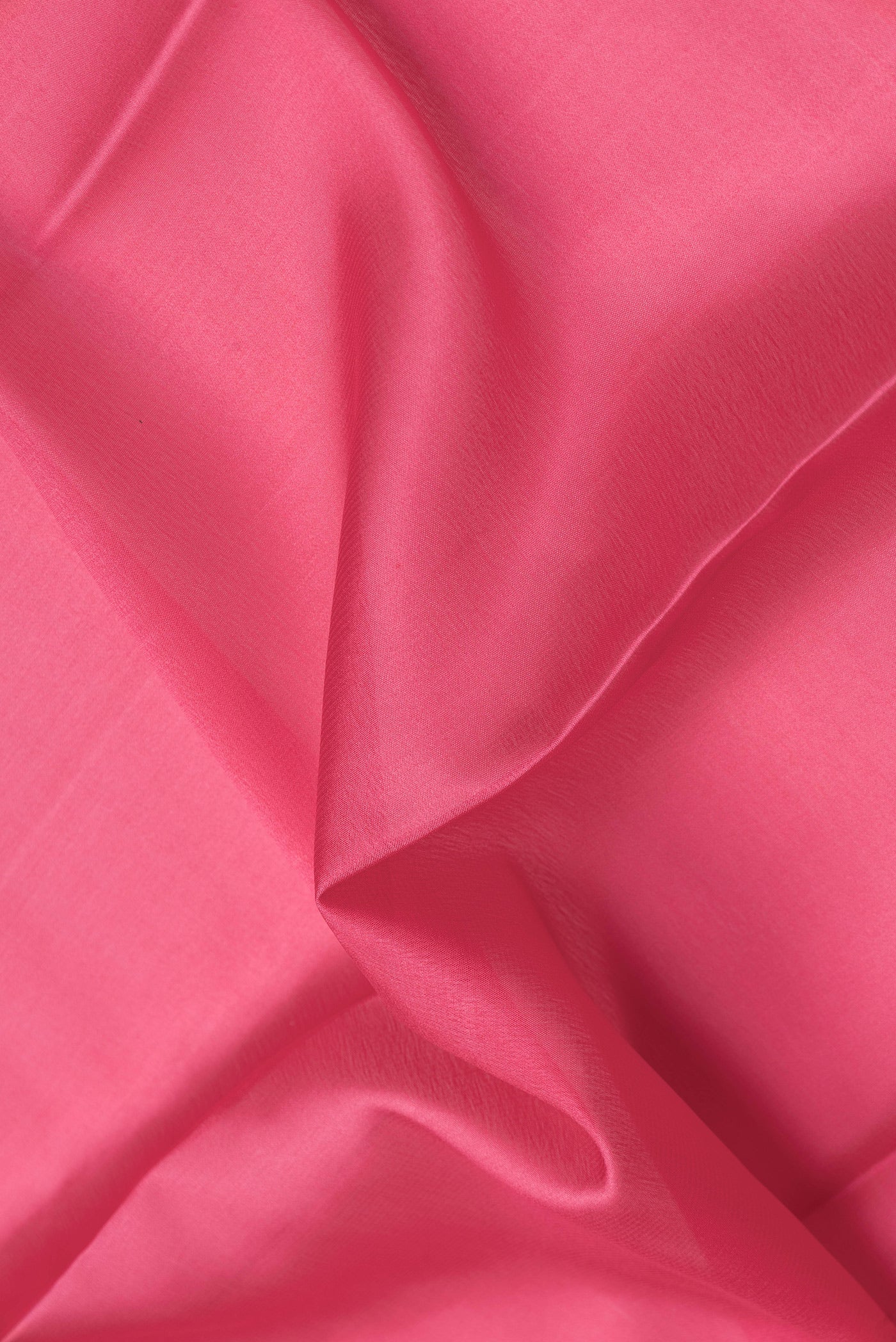 Close up of Pink Dual Tone Mysore Silk Saree with Plain Body and Zari Border.  displaying folds
