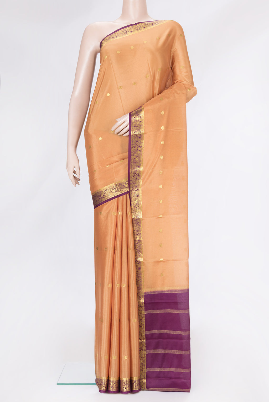 Beige Dual Tone Mysore Silk Saree with Zari Butta on the body and Zari Border.  displayed on a mannequin