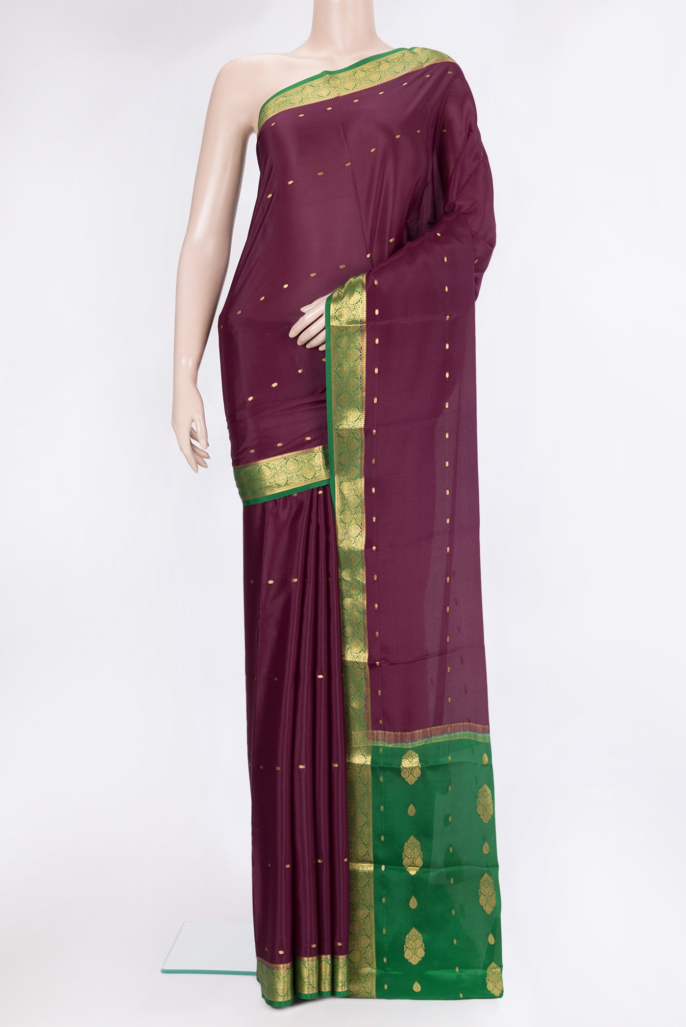 Burgundy Mysore Silk Saree with Zari Butta on the body and Zari Border.  displayed on a mannequin