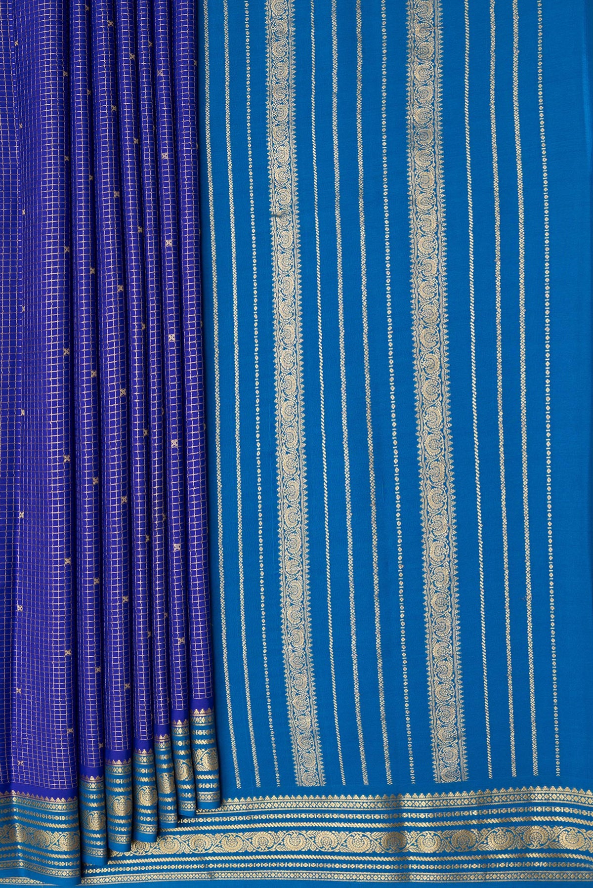 Pleats and pallu of Royal Blue Dual Tone Mysore Silk Saree with Checked design on the body and Zari Border. 