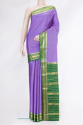 Lavender Mysore Crepe Saree with Checked design on the body and Zari Border.  displayed on a mannequin