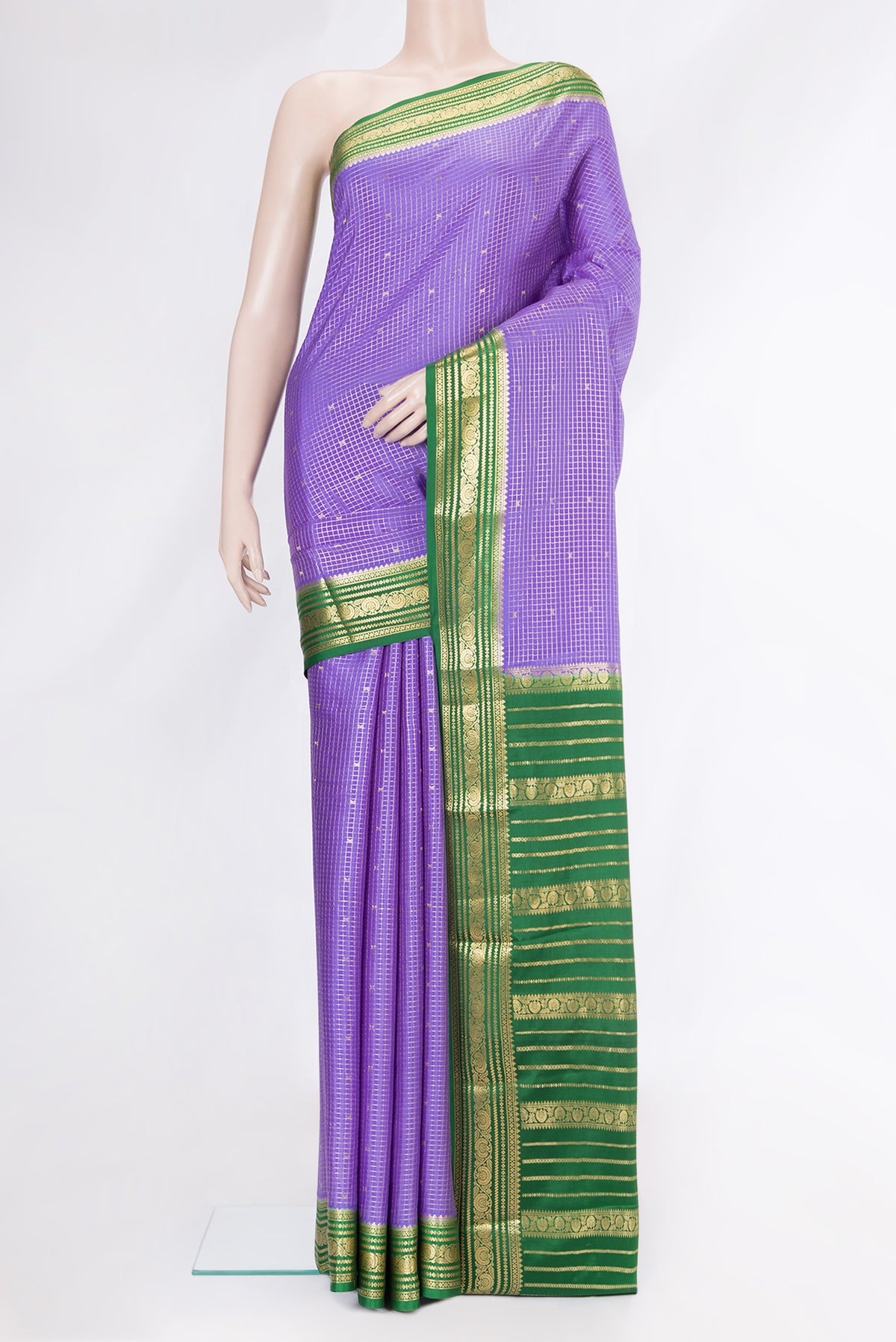 Lavender Mysore Crepe Saree with Checked design on the body and Zari Border.  displayed on a mannequin