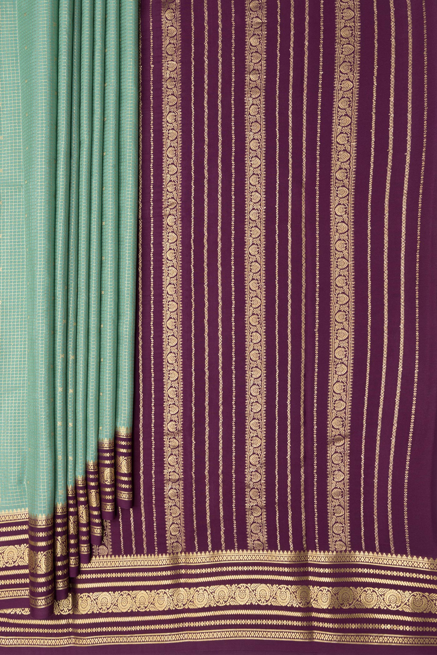 Pleats and pallu of Light Green Dual Tone Mysore Silk Saree with Checked design on the body and Zari Border. 