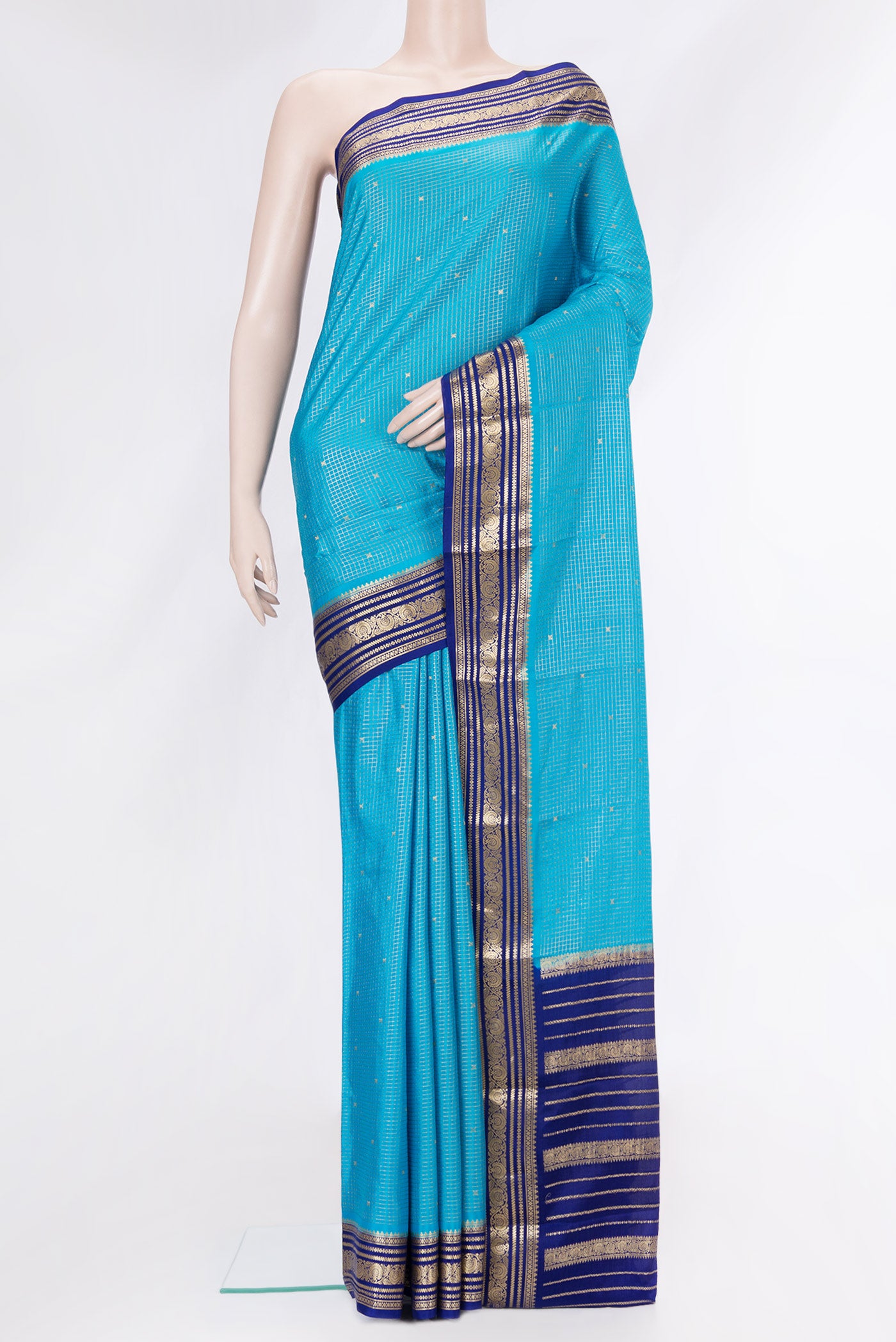 Sky Blue Dual Tone Mysore Silk Saree with Checked design on the body and Zari Border.  displayed on a mannequin