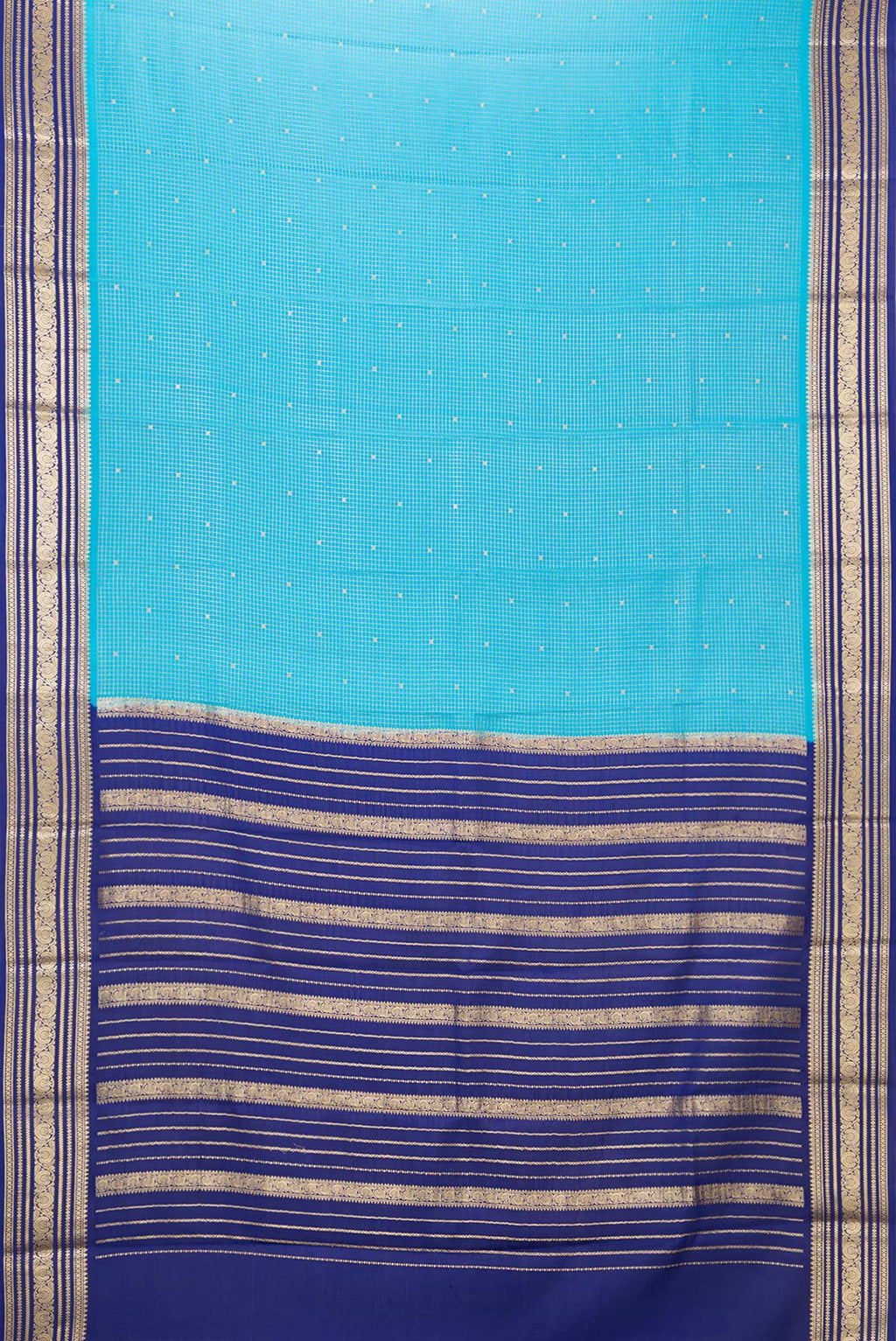Flat view of Sky Blue Dual Tone Mysore Silk Saree with Checked design on the body and Zari Border. 
