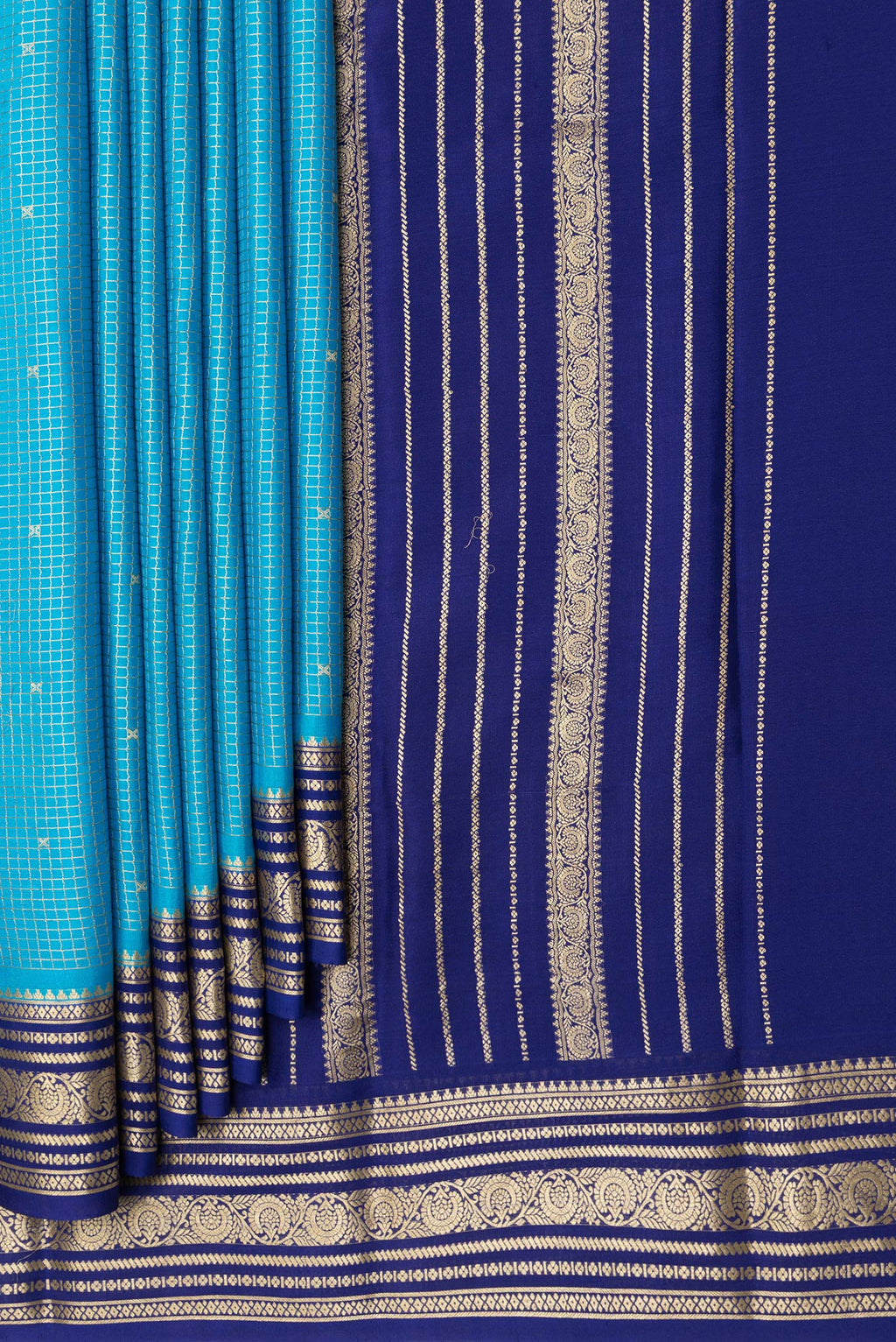 Pleats and pallu of Sky Blue Dual Tone Mysore Silk Saree with Checked design on the body and Zari Border. 