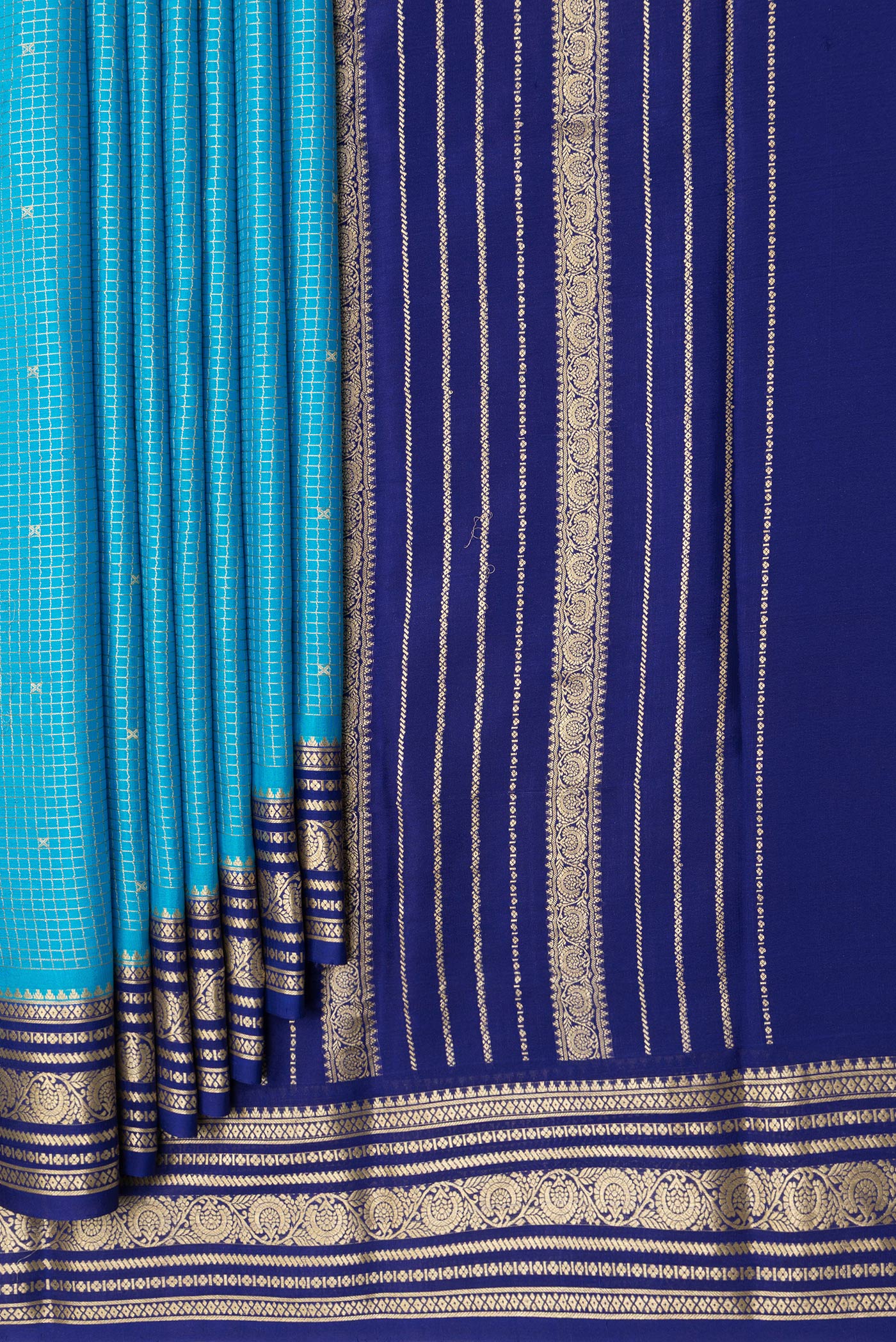 Pleats and pallu of Sky Blue Dual Tone Mysore Silk Saree with Checked design on the body and Zari Border. 