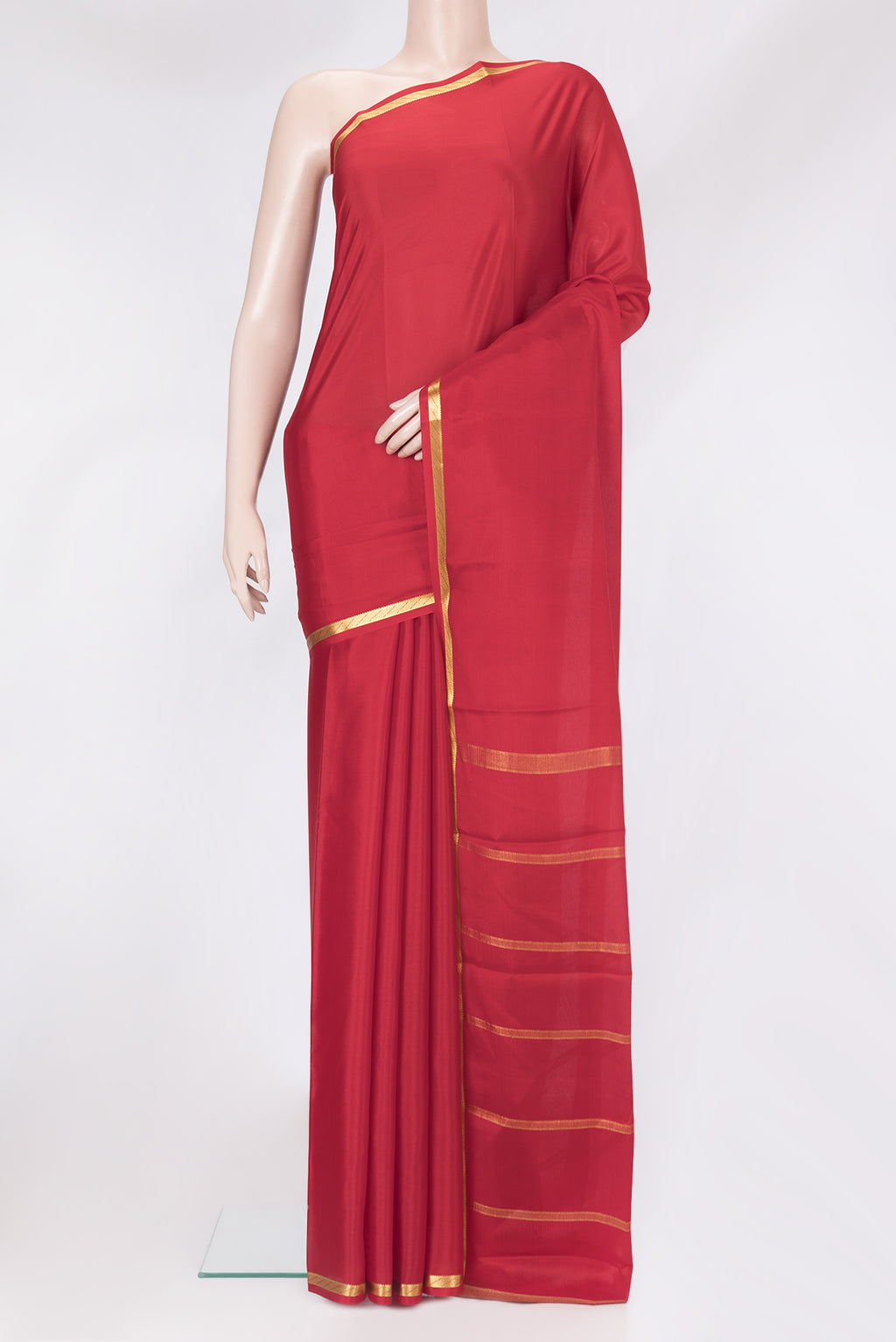 Red Mysore Crepe Saree with Plain Body and Zari Border.  displayed on a mannequin
