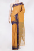 Mustard Kanchi Cotton Saree with Plain Body and Temple Border.  displayed on a mannequin