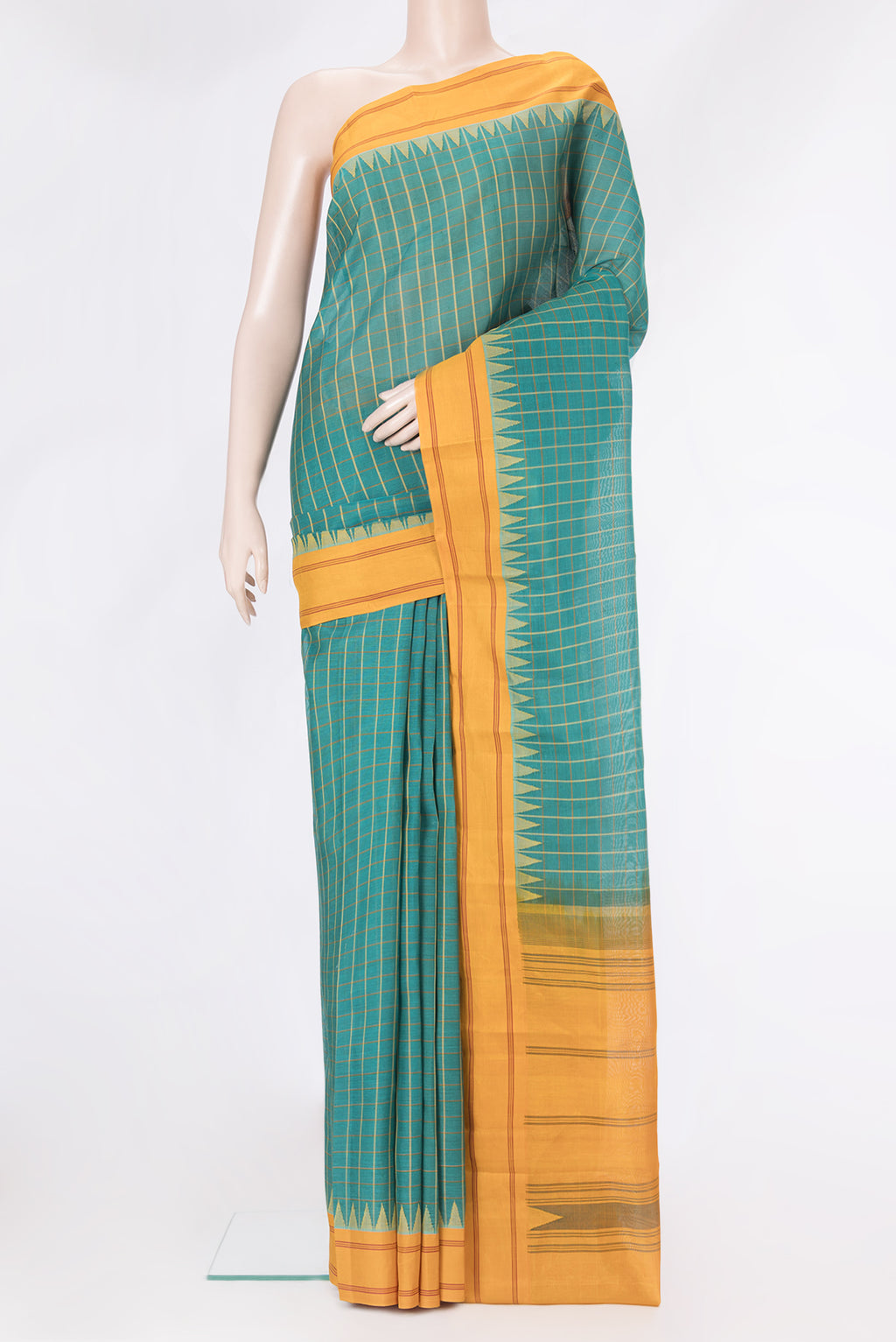 Green Kanchi Cotton Saree with Checked design on the body and Plain Border.  displayed on a mannequin