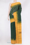 Bottle Green Kanchi Cotton Saree with Plain Body and Temple Border.  displayed on a mannequin