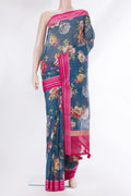 Pure Silk Peacock Blue Kota Saree with Floral Print on the body and Thread Border.  displayed on a mannequin