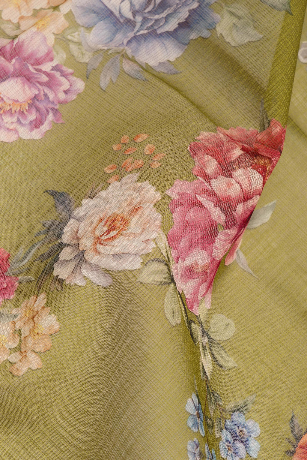Close up of Pure Silk Mehandi Green Kota Saree with Floral Print on the body and Thread Border.  displaying folds
