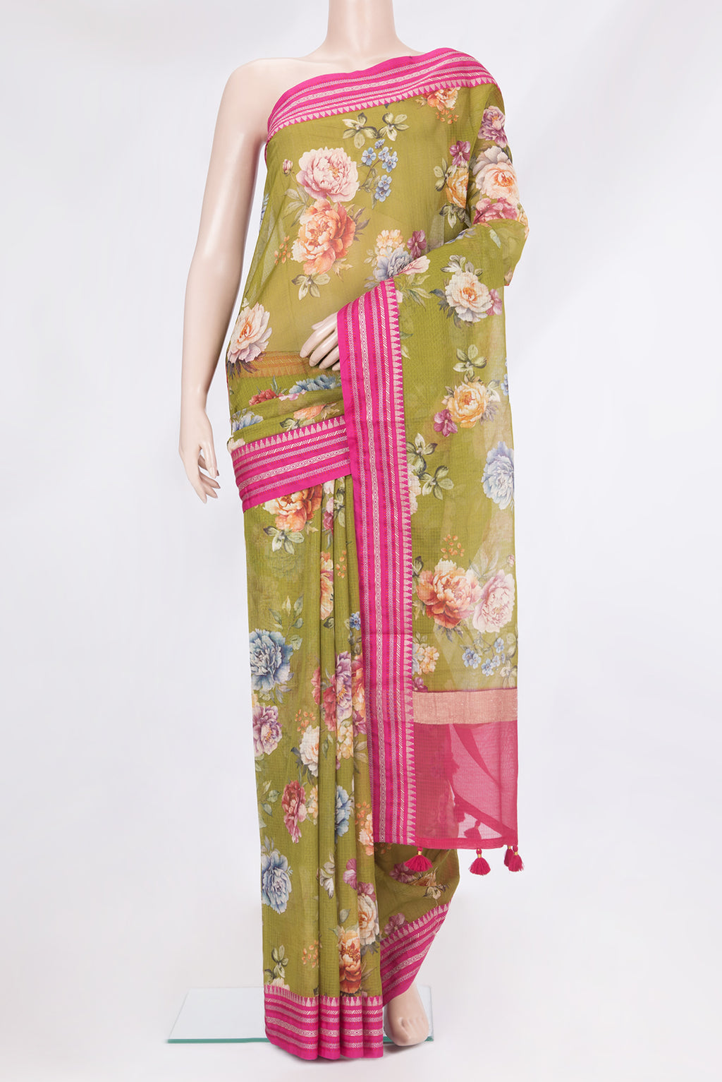 Pure Silk Mehandi Green Kota Saree with Floral Print on the body and Thread Border.  displayed on a mannequin