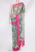 Green Kota Silk Saree with Printed design on the body and Thread Border.  displayed on a mannequin