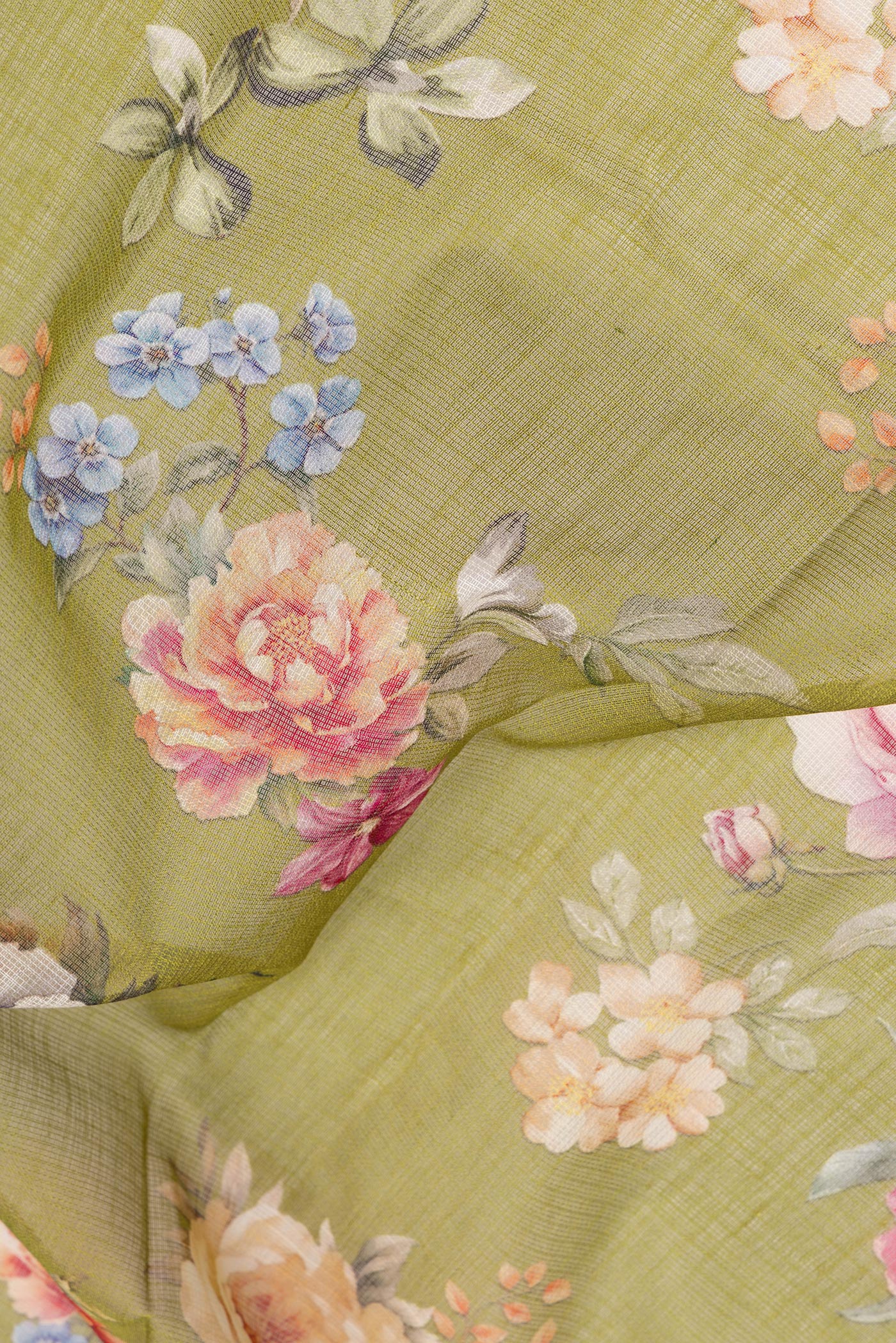 Close up of Mehandi Green Kota Silk Saree with Floral Print on the body and Thread Border.  displaying folds