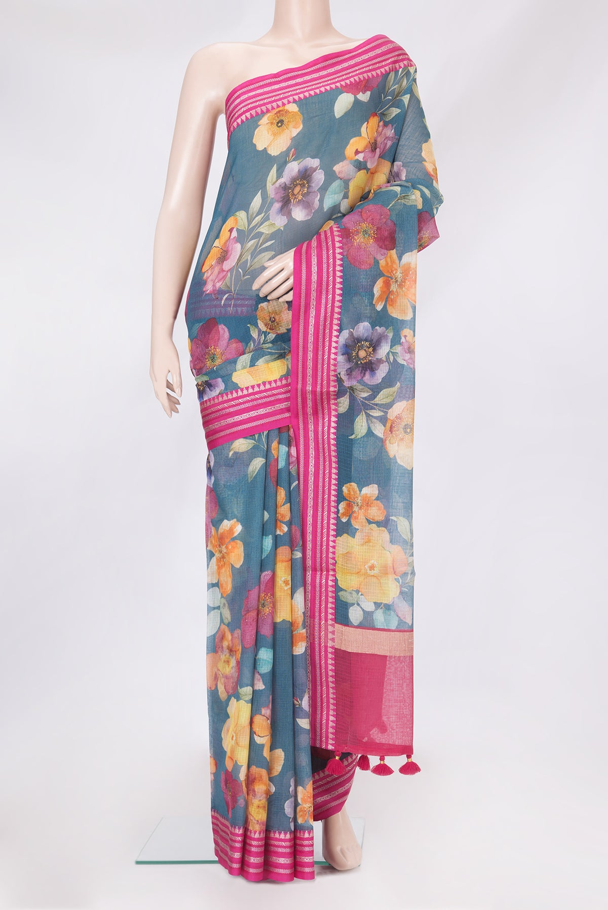 Grey Kota Silk Saree with Floral Print on the body and Thread Border.  displayed on a mannequin