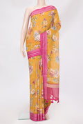Mustard Kota Silk Saree with Floral Print on the body and Thread Border.  displayed on a mannequin