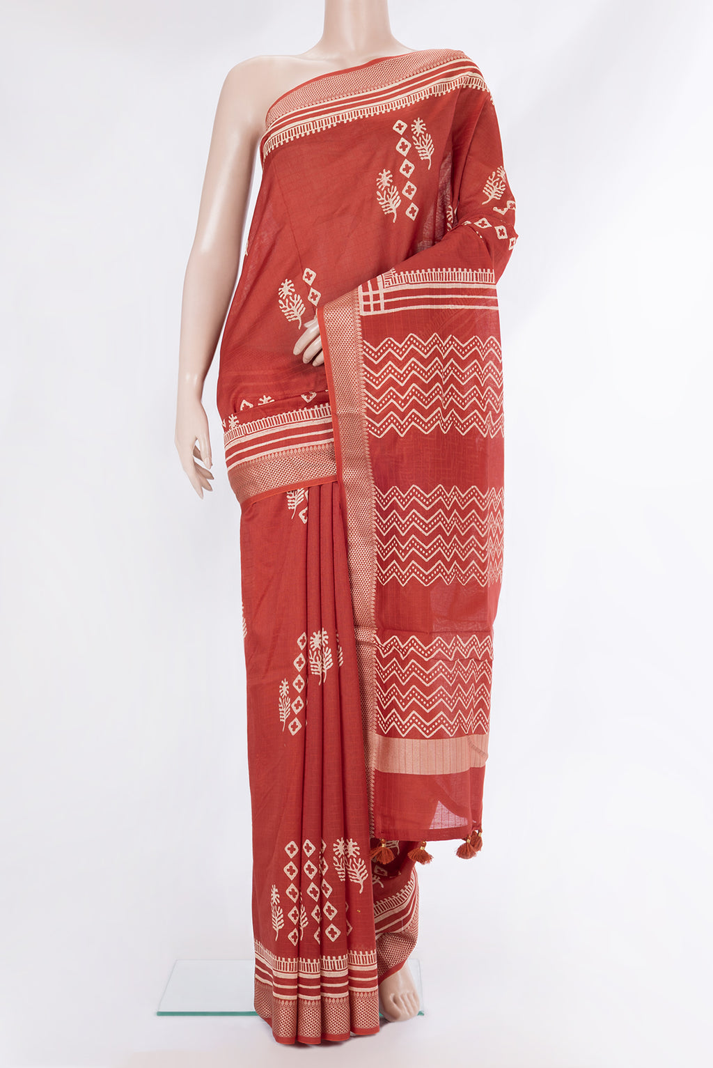 Pure Silk Rust Dual Tone Chanderi Saree with Printed design on the body and Thread Border.  displayed on a mannequin