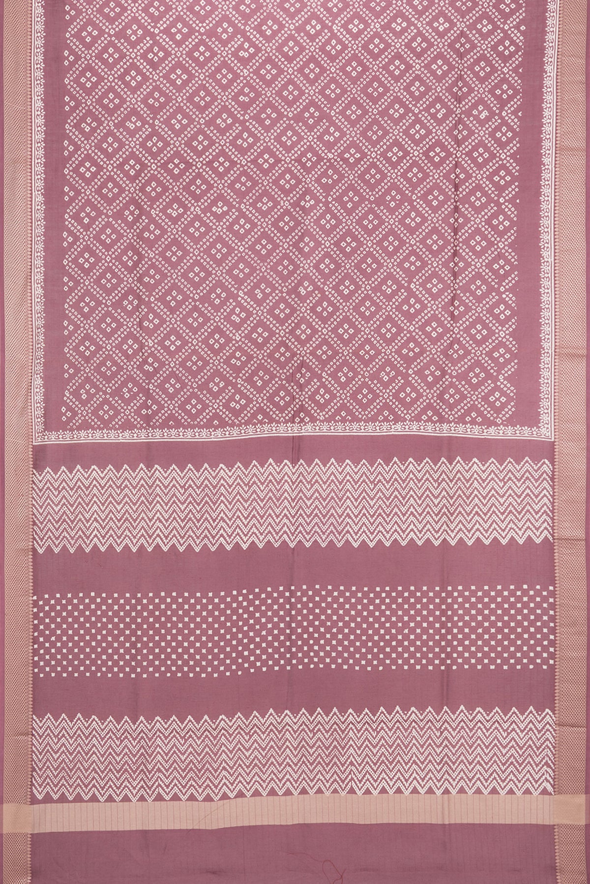 Flat view of Mauve Chanderi Cotton Saree with Bandhani Print on the body and Thread Border. 
