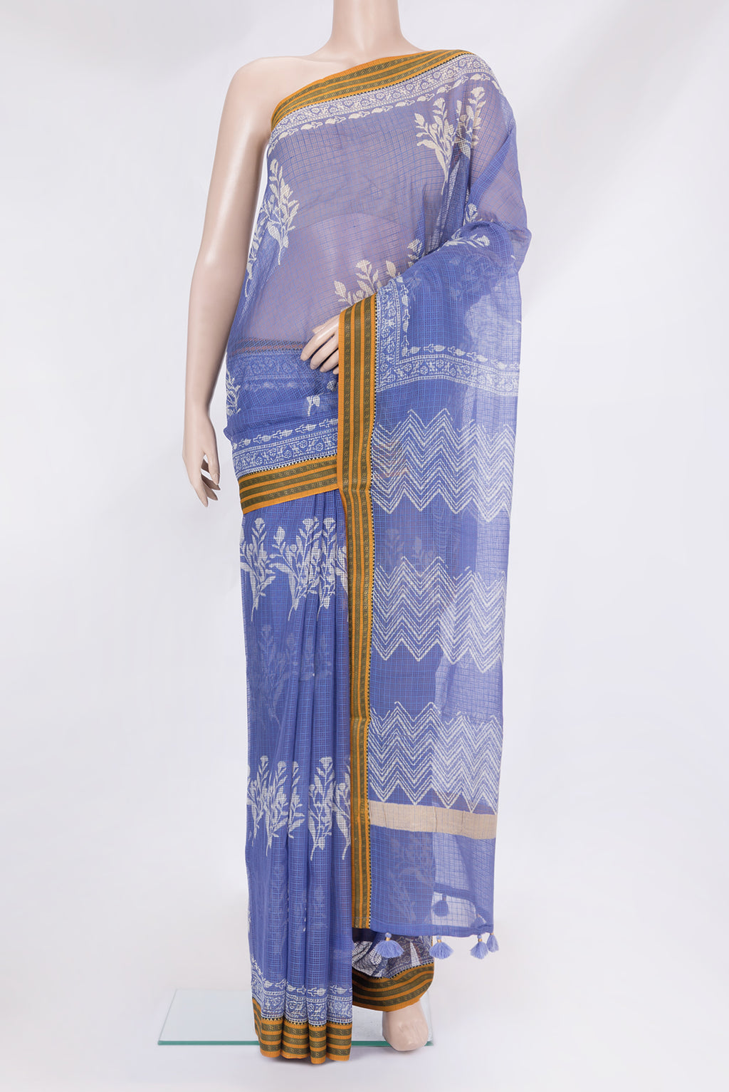 Blue Kota Silk Saree with Floral Print on the body and Thread Border.  displayed on a mannequin