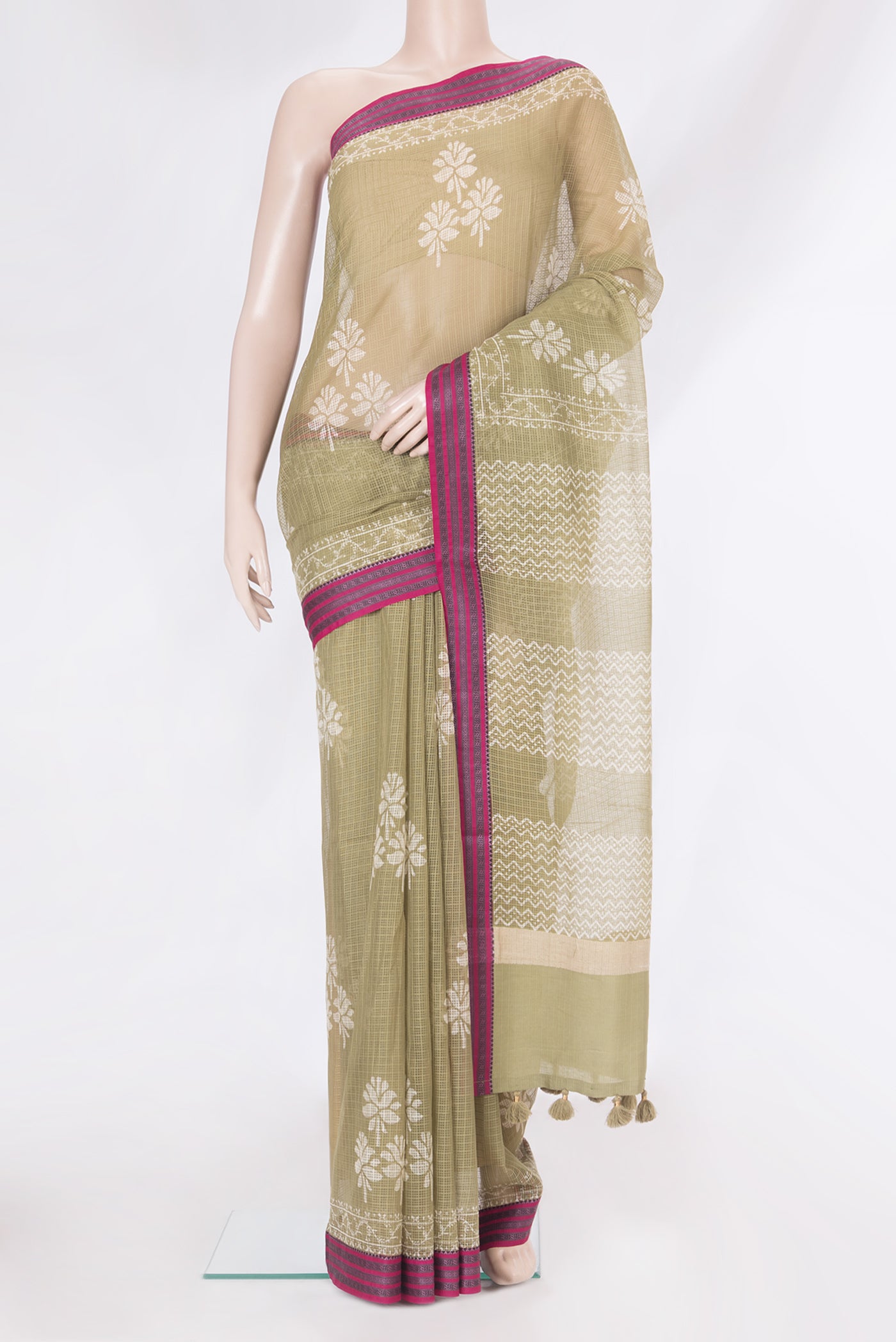 Mehandi Green Kota Silk Saree with Checked design on the body and Thread Border.  displayed on a mannequin