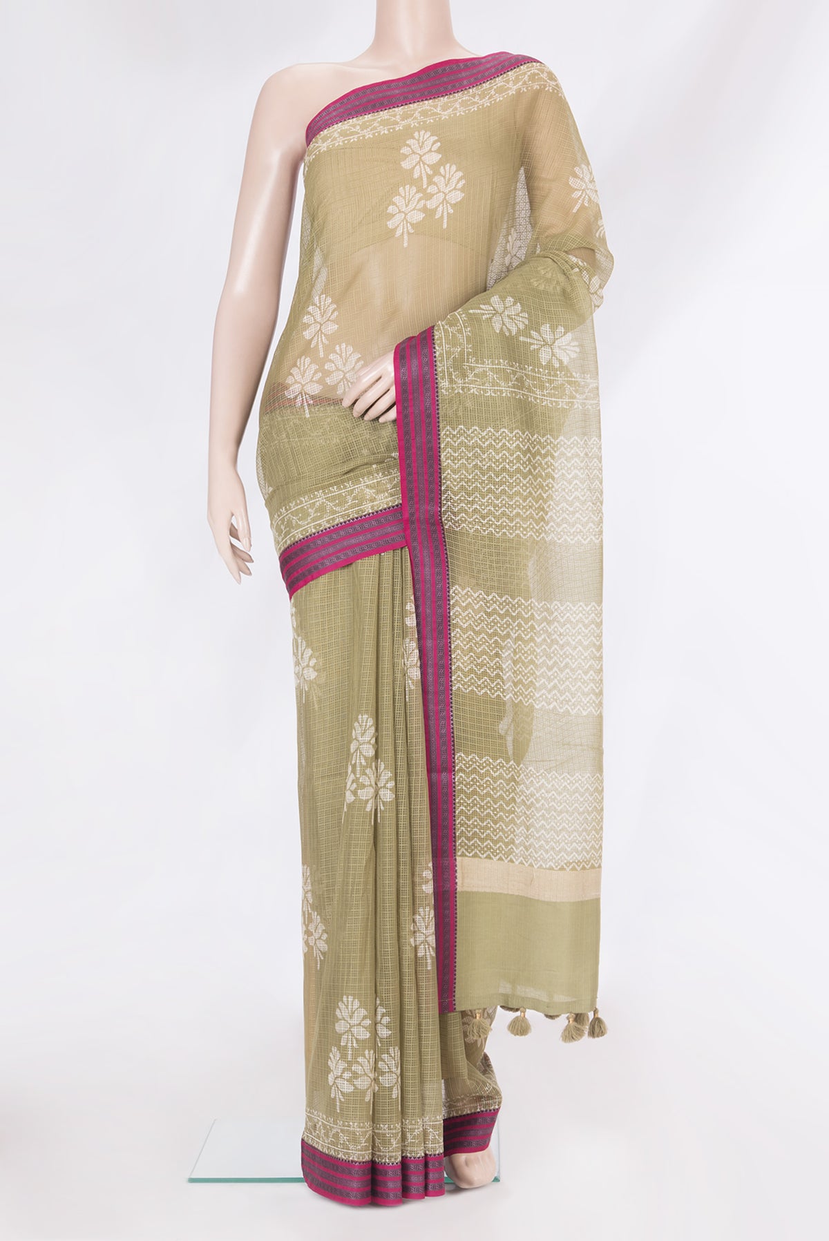Mehandi Green Kota Silk Saree with Checked design on the body and Thread Border.  displayed on a mannequin