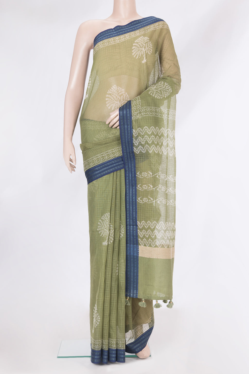 Sage Green Kota Silk Saree with Checked design on the body and Thread Border.  displayed on a mannequin